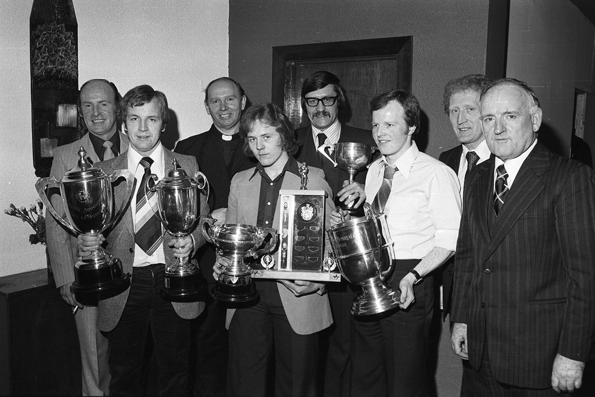 Mickey Gallagher, Andy McCallin, Fr Murphy, Brendan Grieve, Roy McIlroy, Jim Donnelly, Seamus O'Hare and Antrim Chairman Jack Rooney at St John's GAC football awards celebration