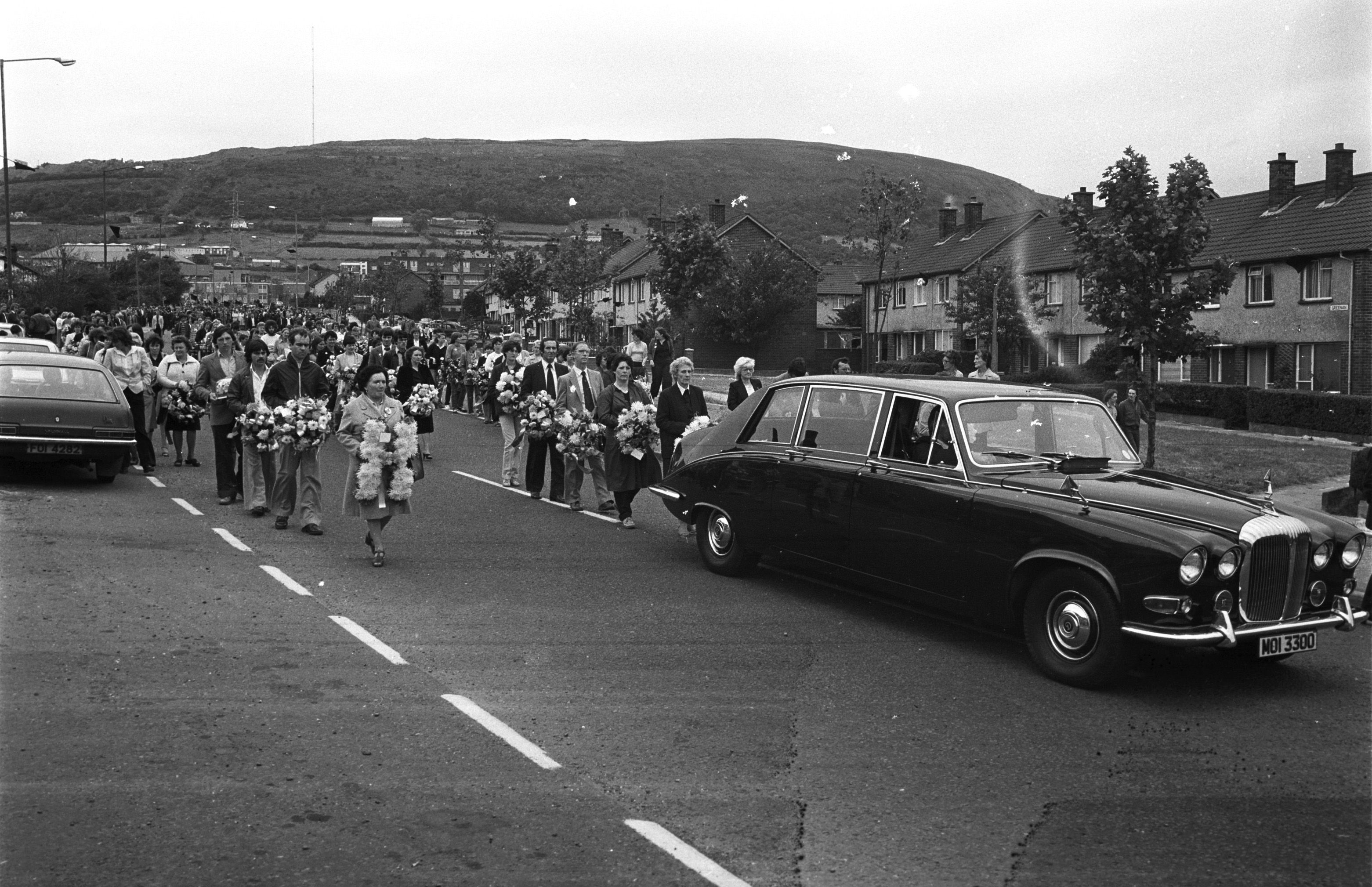 PRIDE: The funeral of Joe McDonnell makes its way down the Shaws Road in July 1981