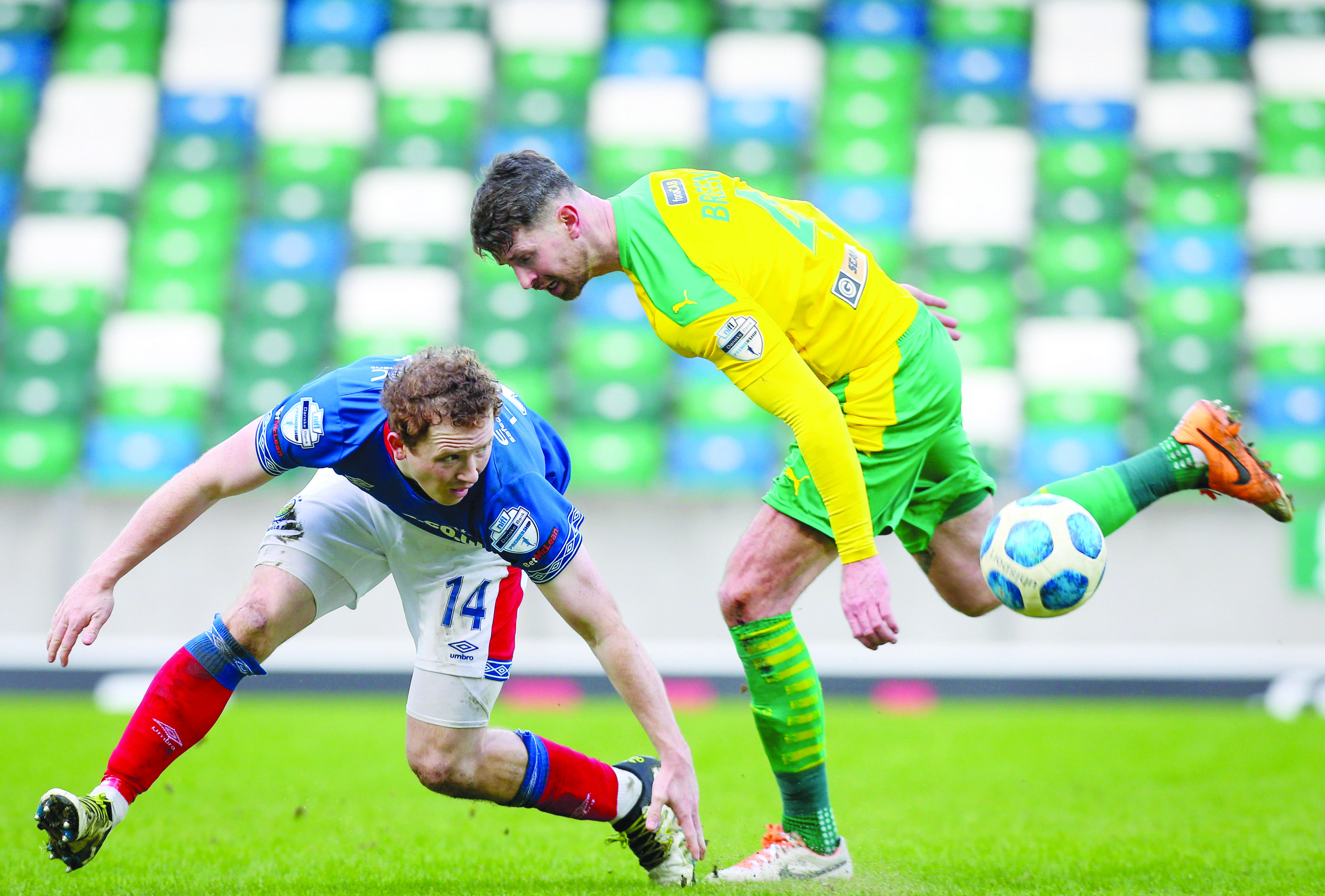 Garry Breen, pictured in action against Shayne Lavery at the weekend, could be out for several weeks due to a hamstring injury picked up in the defeat to Linfield