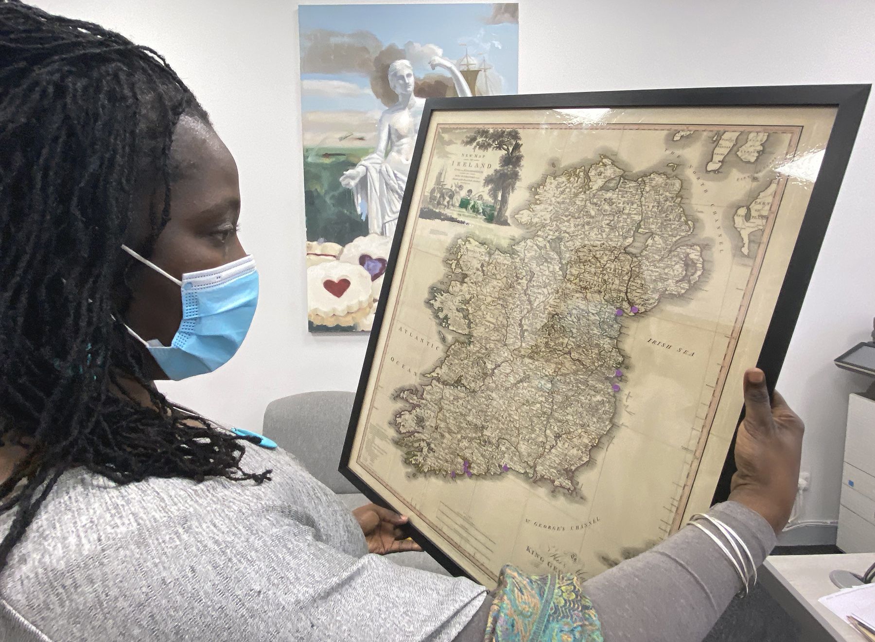 "STRUGGLING FOR RECOGNITION": Marsha Deans of ACSONI with a map from the exhibition on the slave trade.
