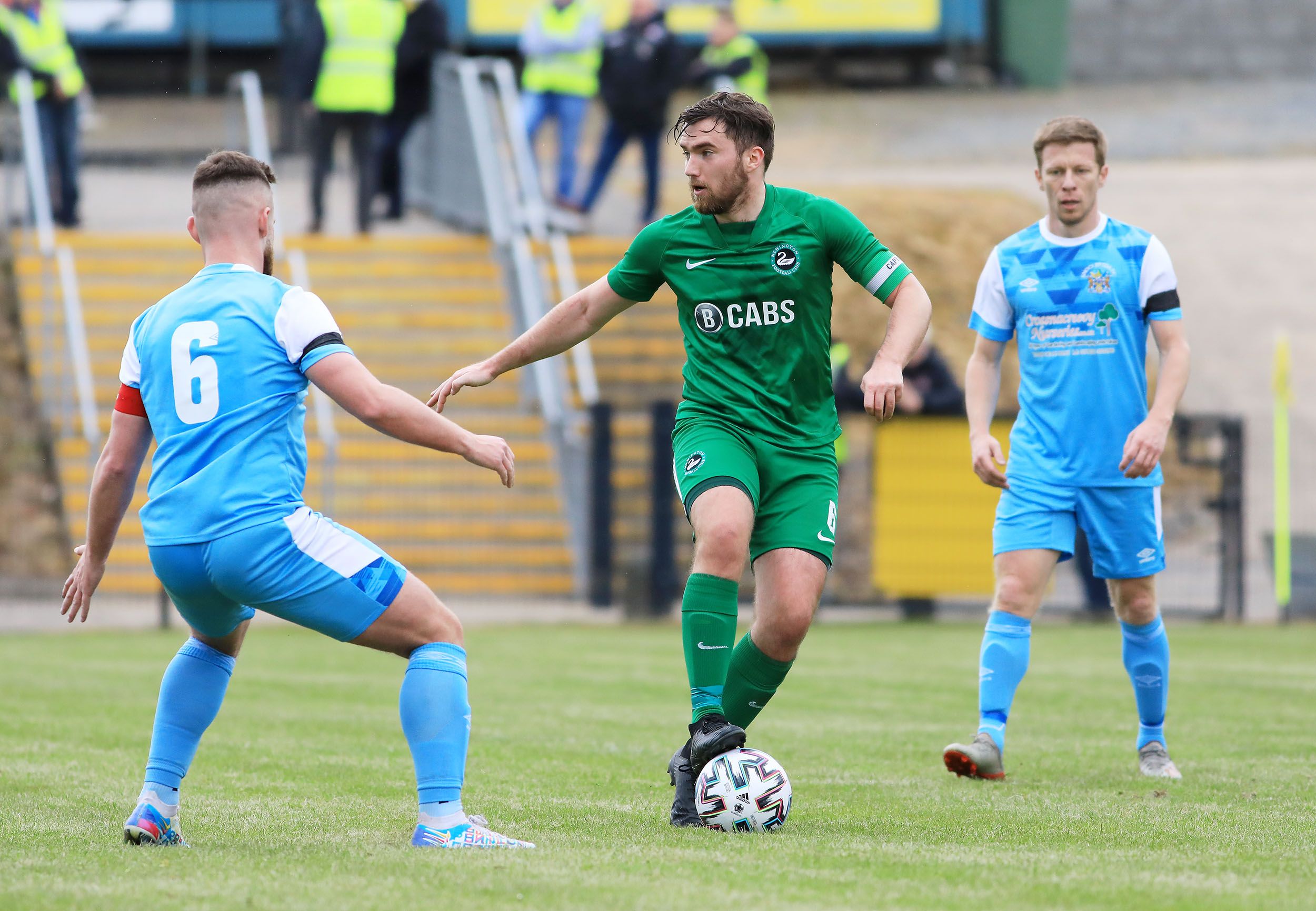 Newington captain Richard Gowdy tries to evade Knockbreda's Francis Rice