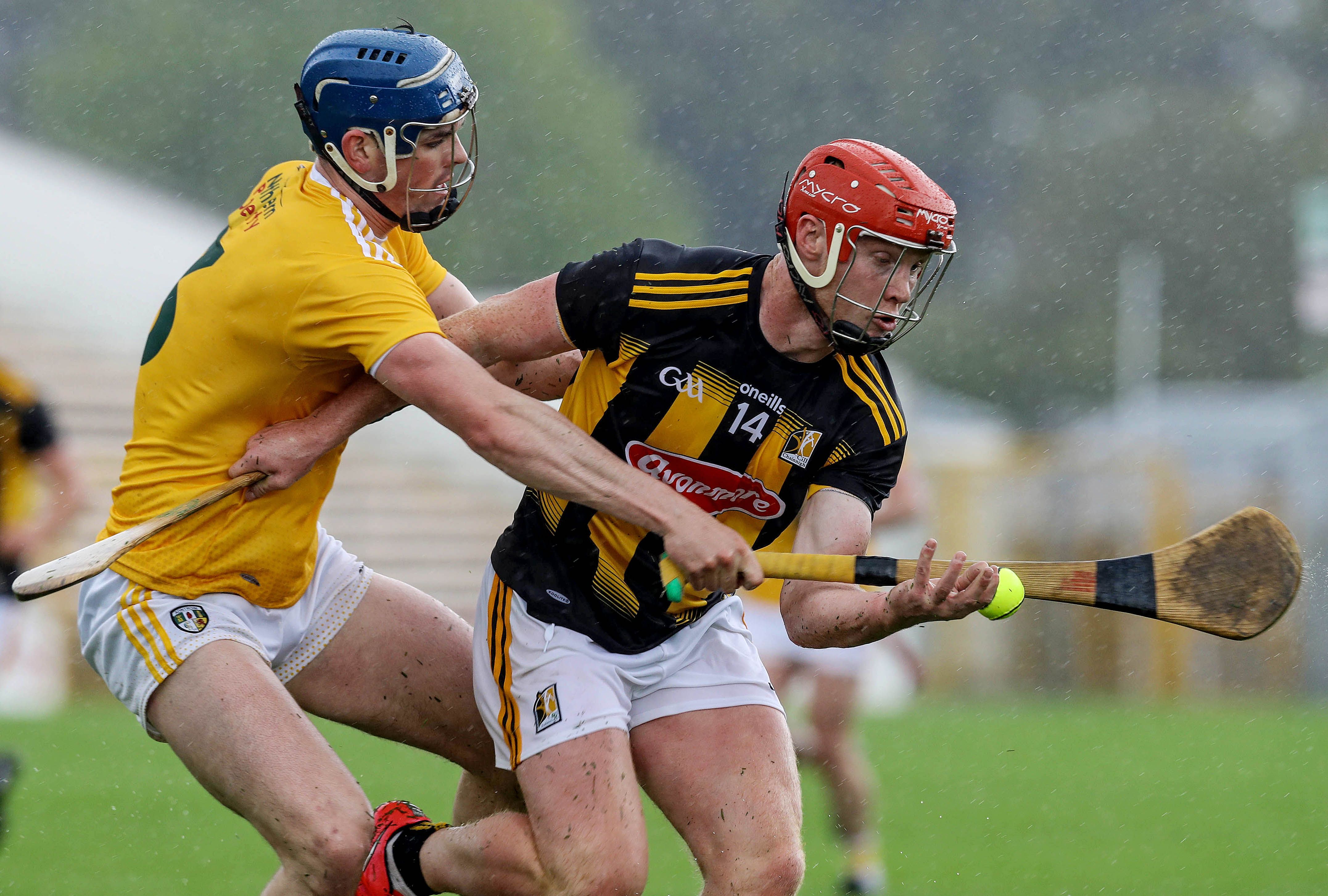 Antrim's Gerard Walsh challenges Adrian Mullen