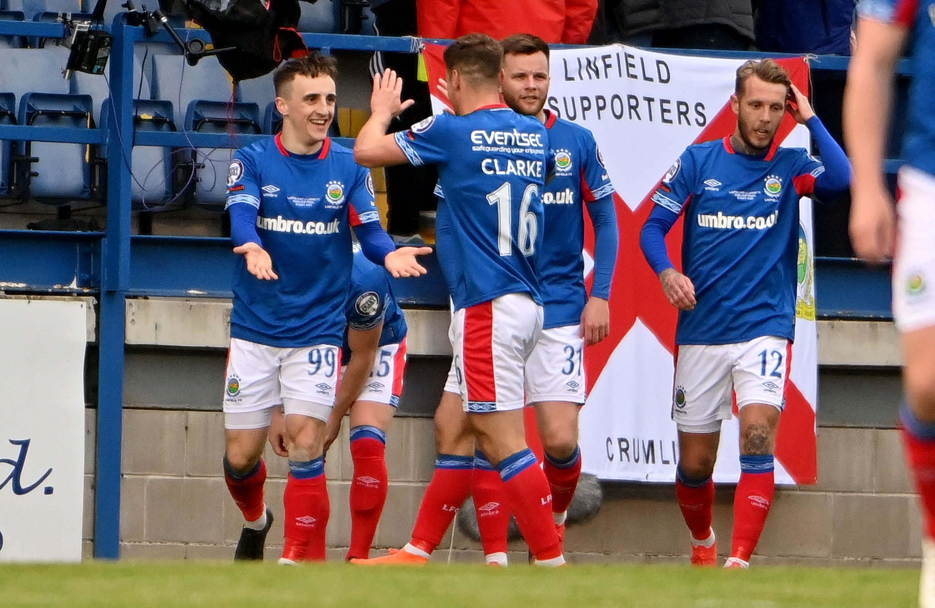 Joel Cooper celebrates after scoring Linfield's second