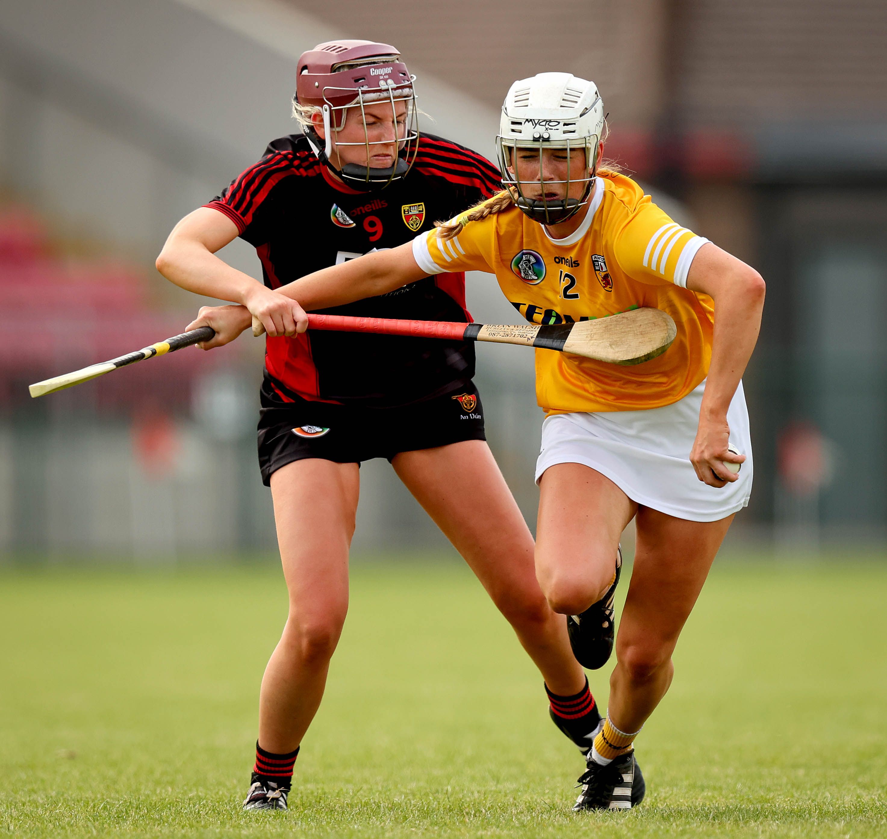 Nicole O'Neill bursts past Aoife Keown
