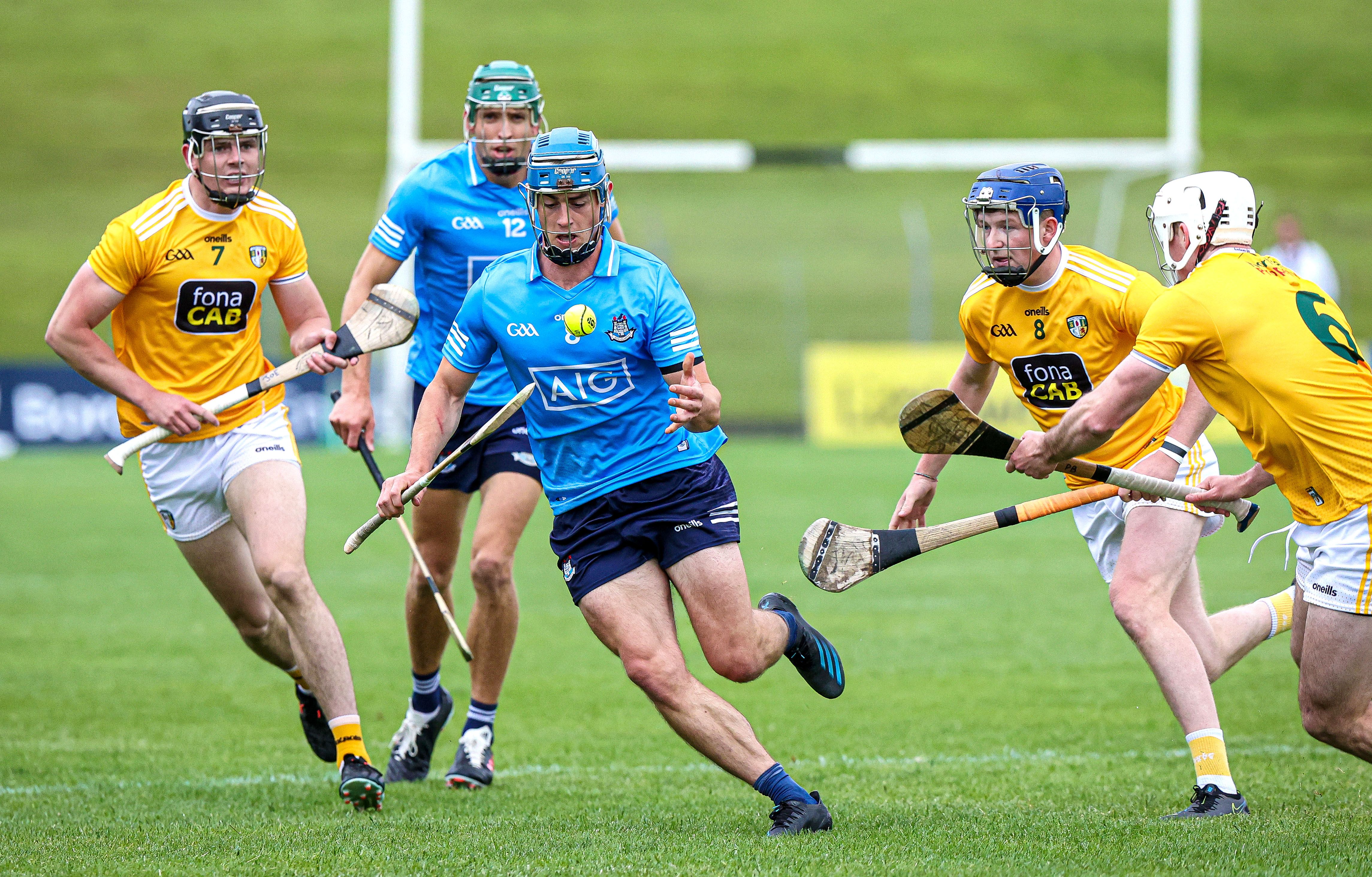 Riain McBride gets clear of Antrim challenges