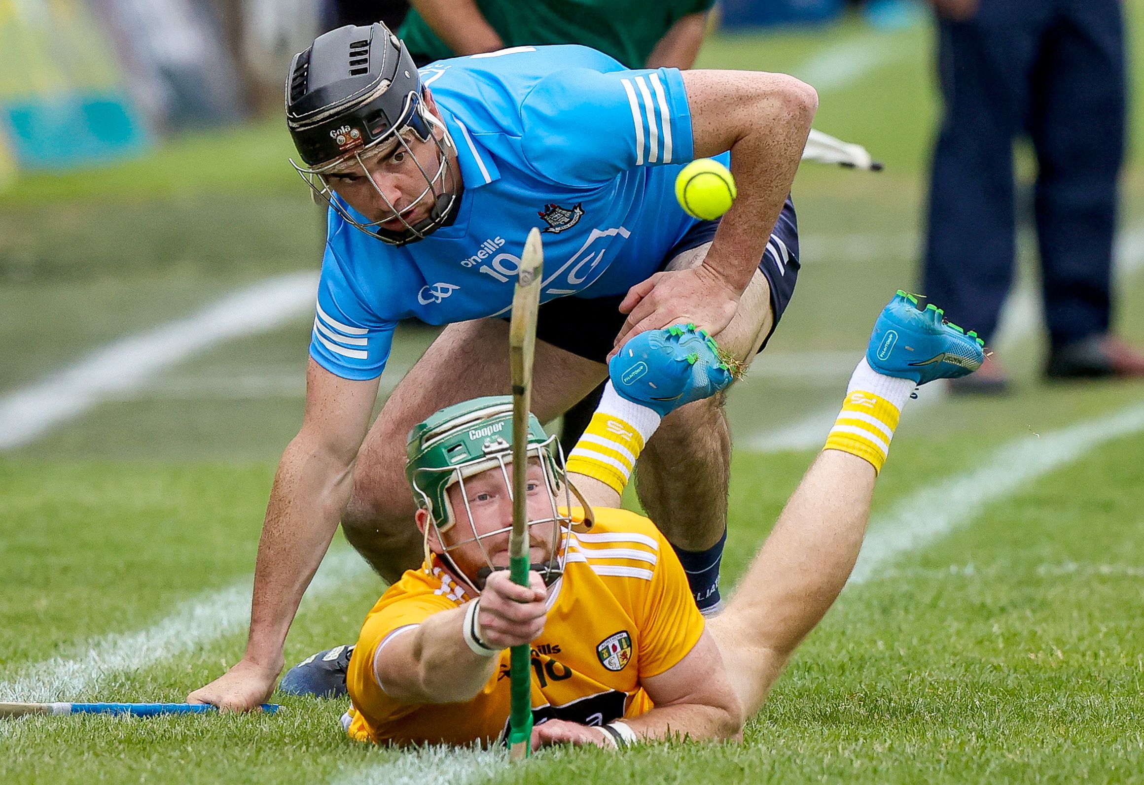 Niall McKenna gets the ball away despite the attention of Danny Sutcliffe