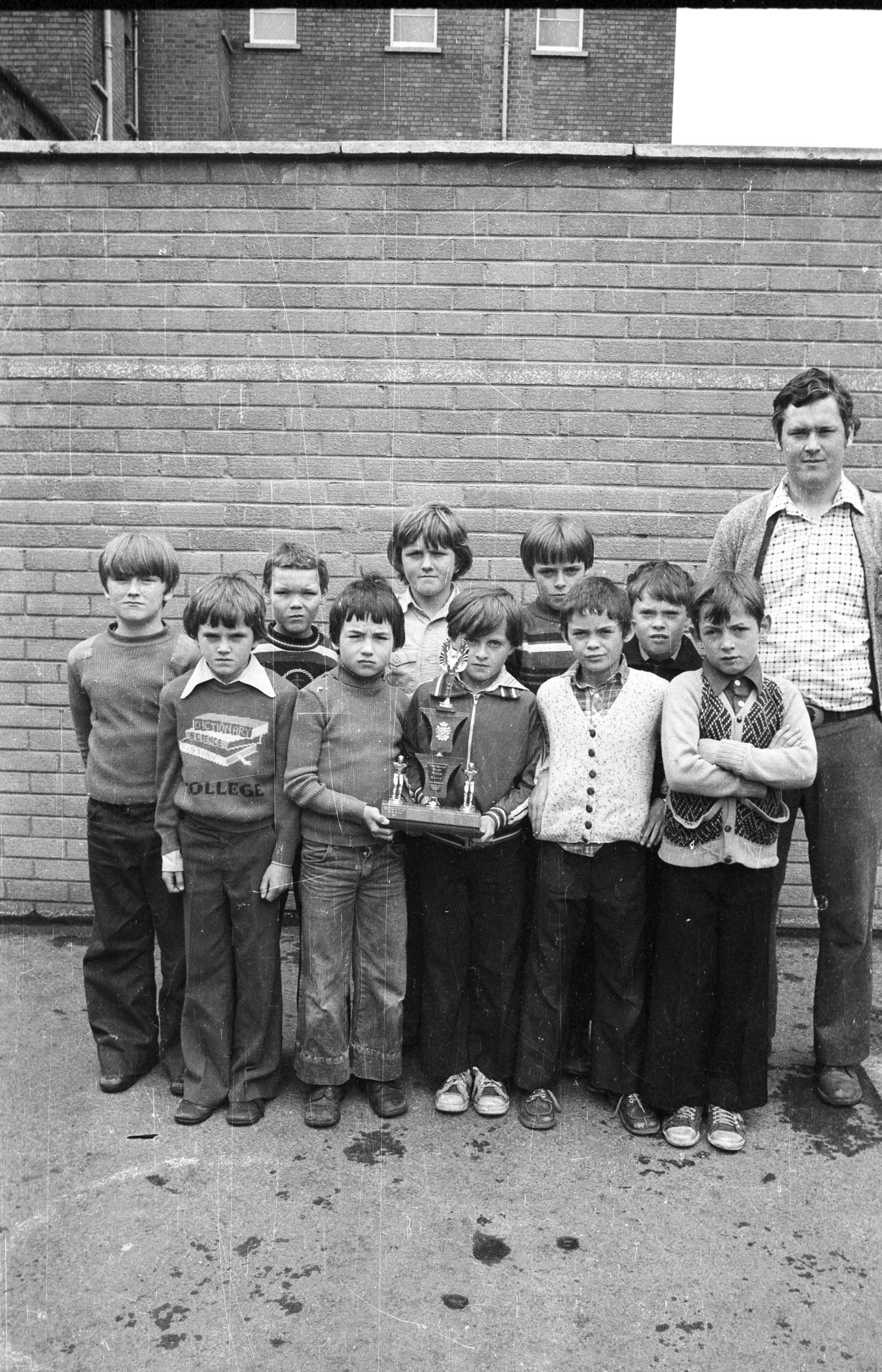 St Finian’s PS winners of West Belfast Swimming Gala, Falls Baths, with teacher Mr McDonald