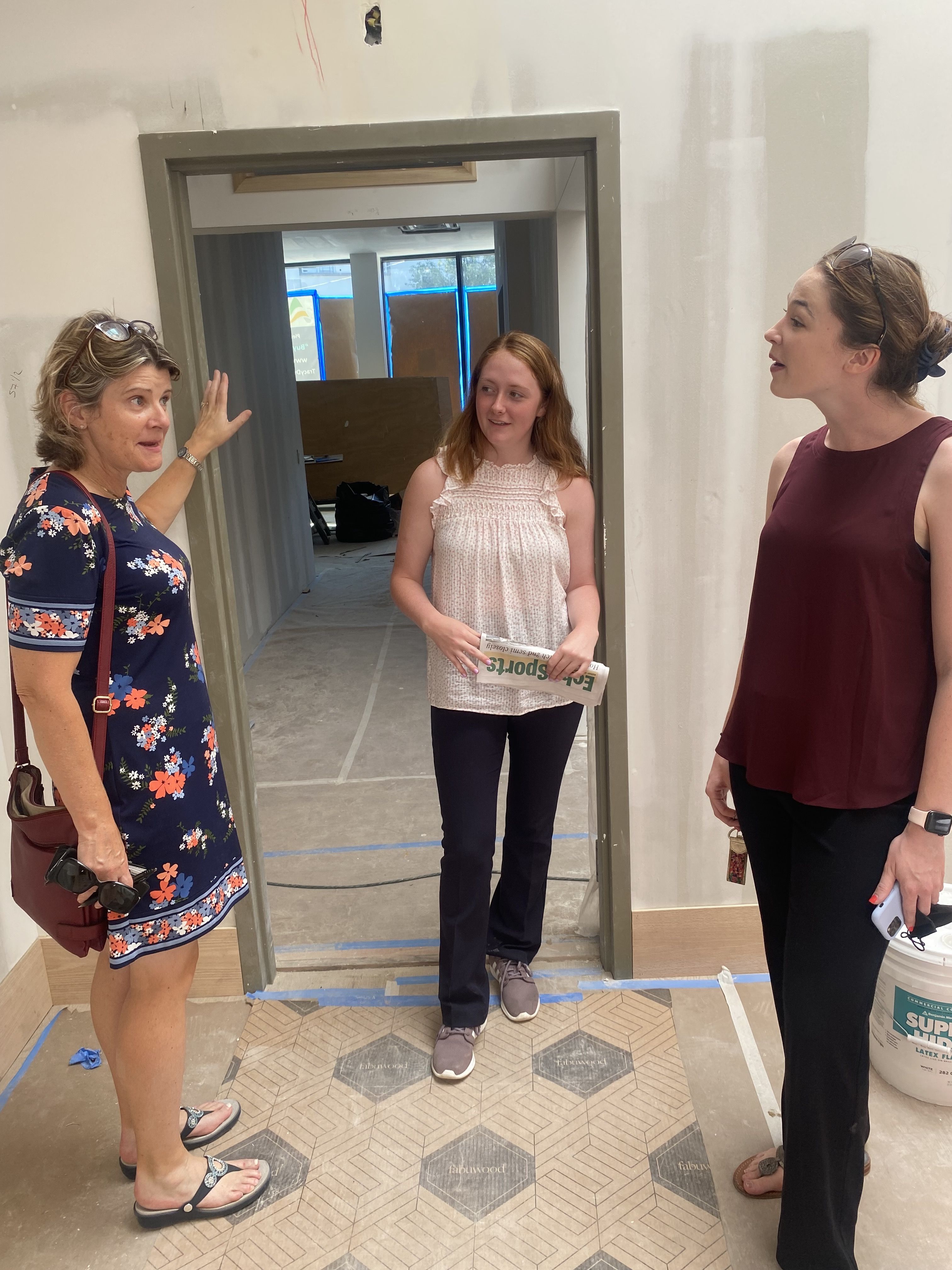 PASSING ON THE TORCH: Caitríona Clarke (l), a native of Leitrim, with Irish American volunteers, Manhattan College intern Aoife Kearney and Development Officer Catherine Rayward