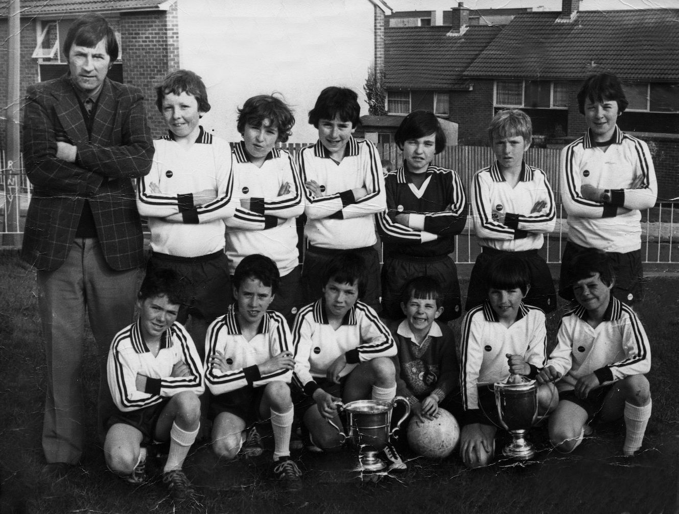 St Oliver Plunkett Under-12 football team with Manager Dominic McEnhill