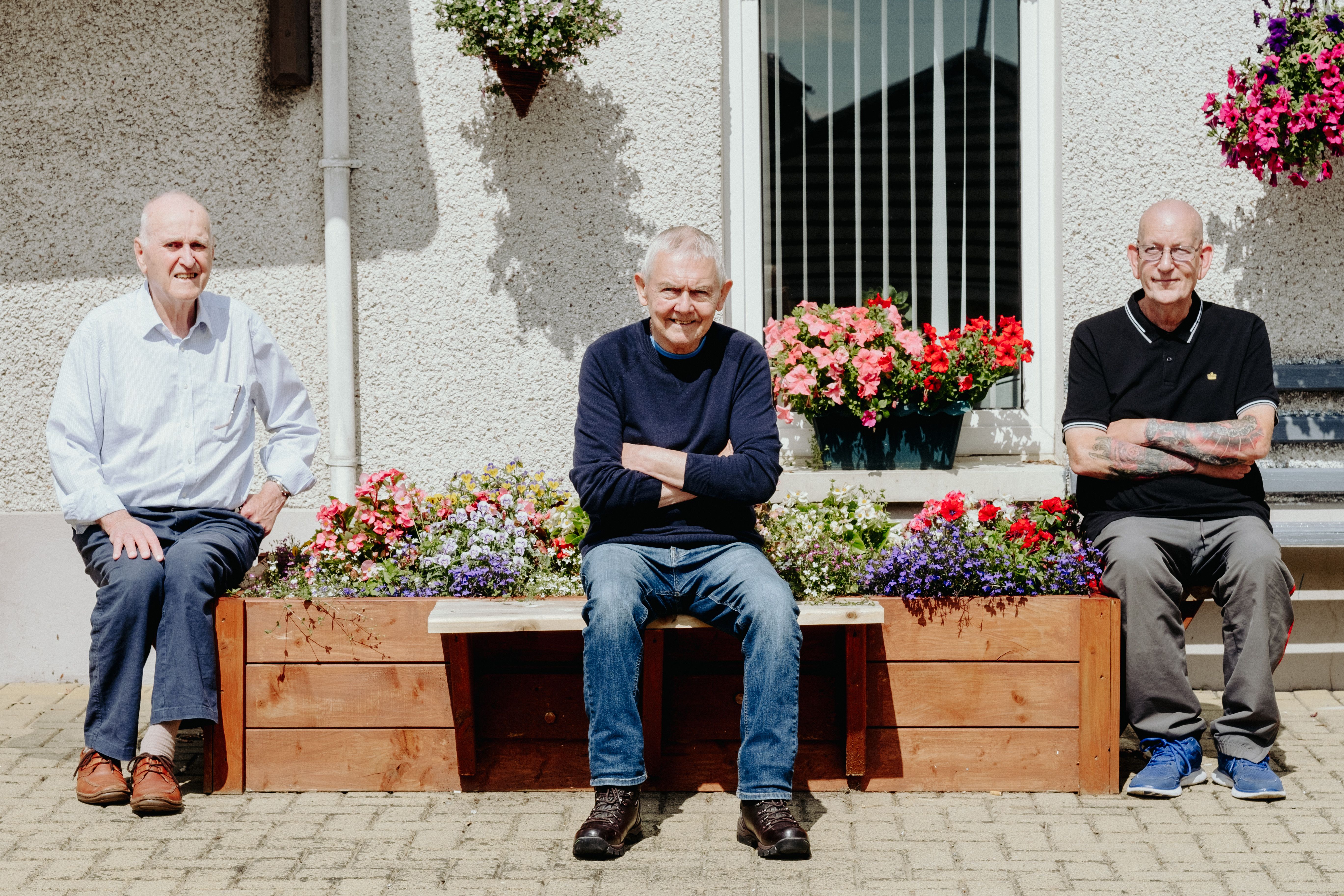 Residents and gardners Peter Gahan, William Cosgrove and Patrick McCormick at Fruithill Fold