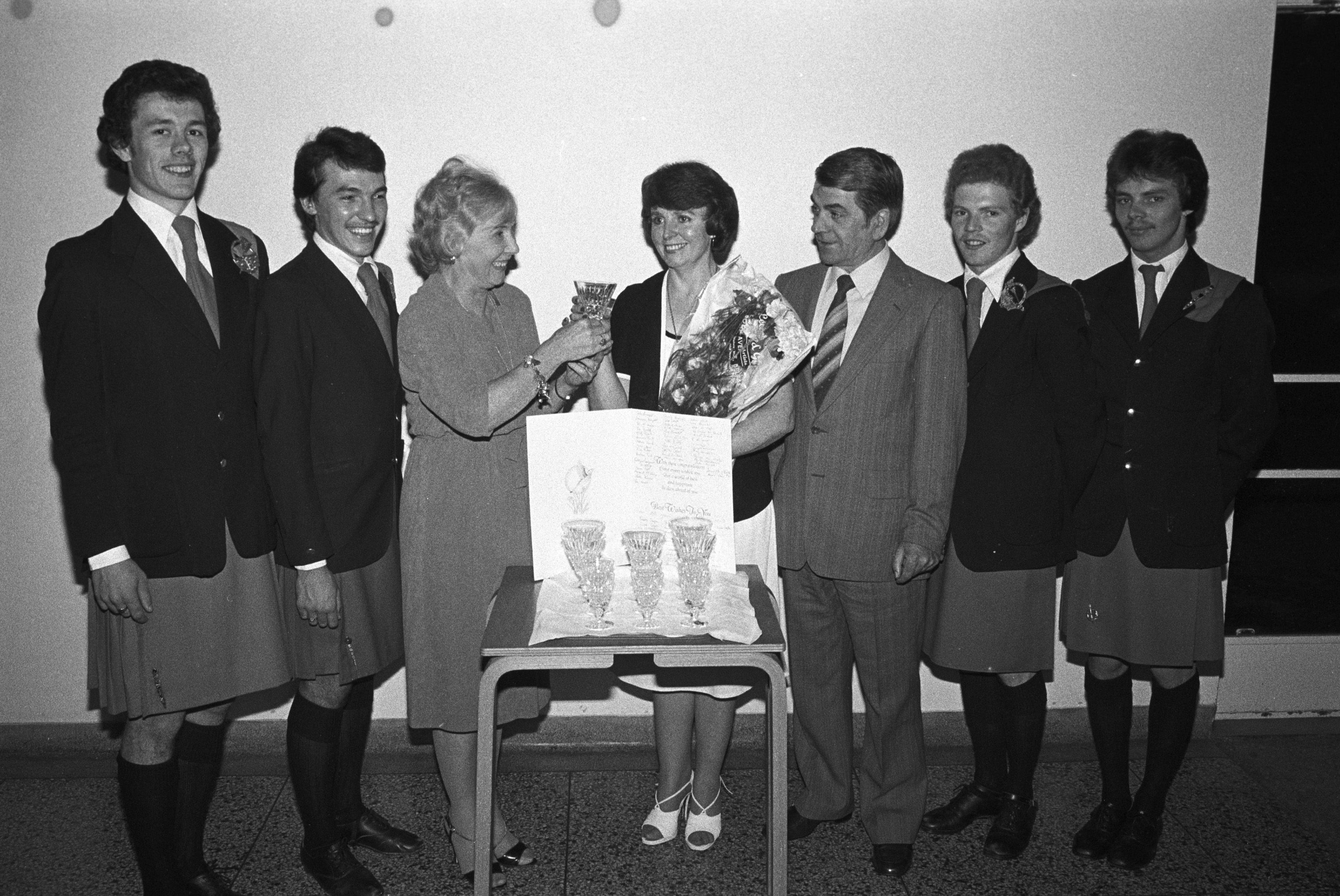 Anna McCoy presents a trophy to former pupils Voureen and Eamonn at the O'Connor School of Dancing 25-year Jubilee celebration