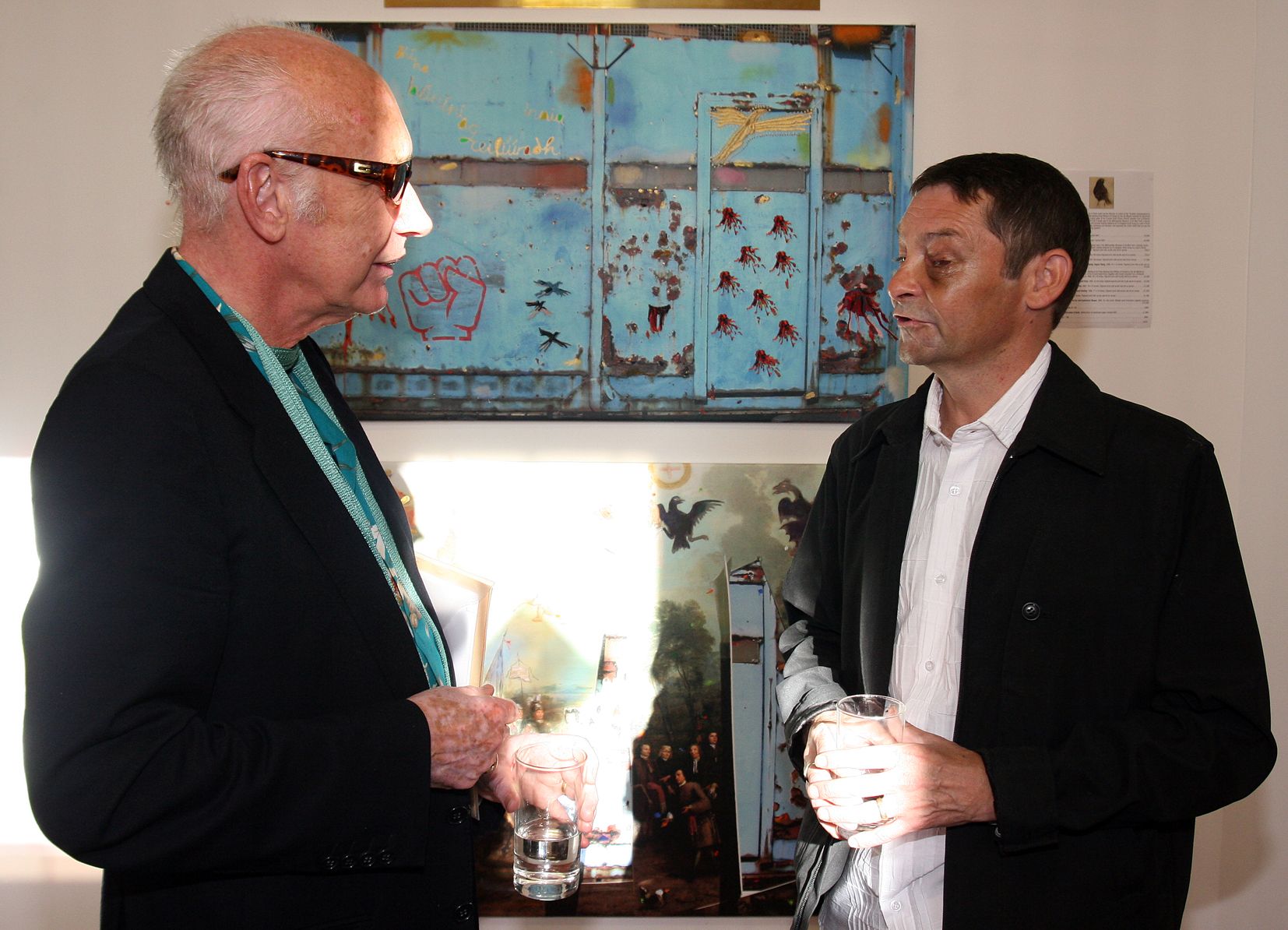 WOUNDED: Conrad Atkinson at his 'Some Wounds Healing, Some Birds Singing' exhibition in 2007 with Paul Denvir who agreed to have his wound depicted in the paintings