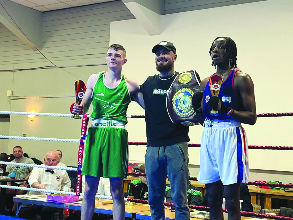 Holy Trinity's Conor Braniff (left) and Liverpool's Mark Gichuki with former Trinity fighter and WBO European champion Lewis Crocker