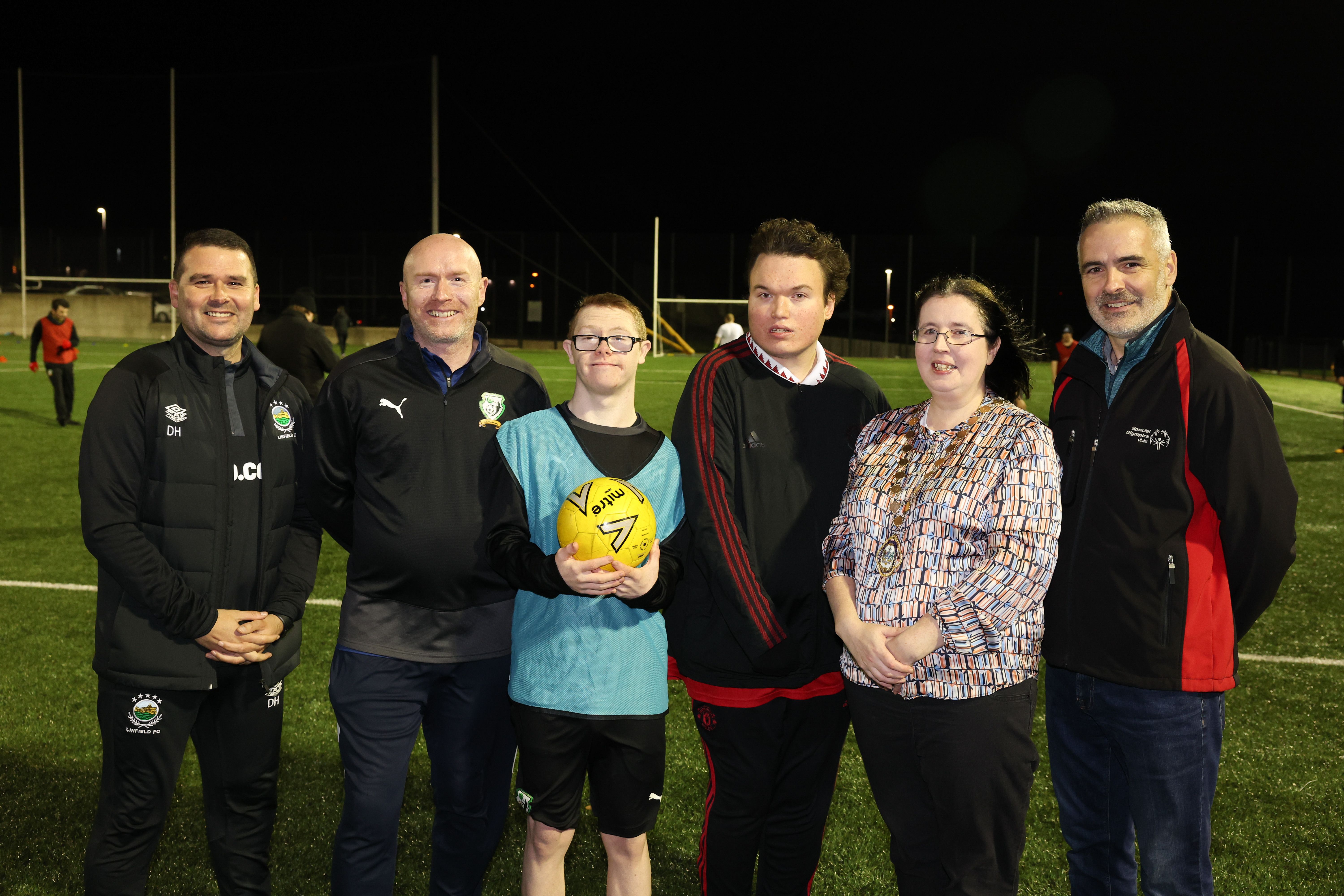 Pictured L-R: David Healy, Manager at Linfield Football Club, Darren Coyle Head Coach at St James Swifts FFA , Pearse Devlin and Liam McNearney, Special Olympics and St James Swifts FFA Athletes, The Deputy Lord Mayor, Councillor Michelle Kelly and Shaun Cassidy, Regional Director Special Olympics Ulster launching the new St James Swifts FFA Special Olympics programme.