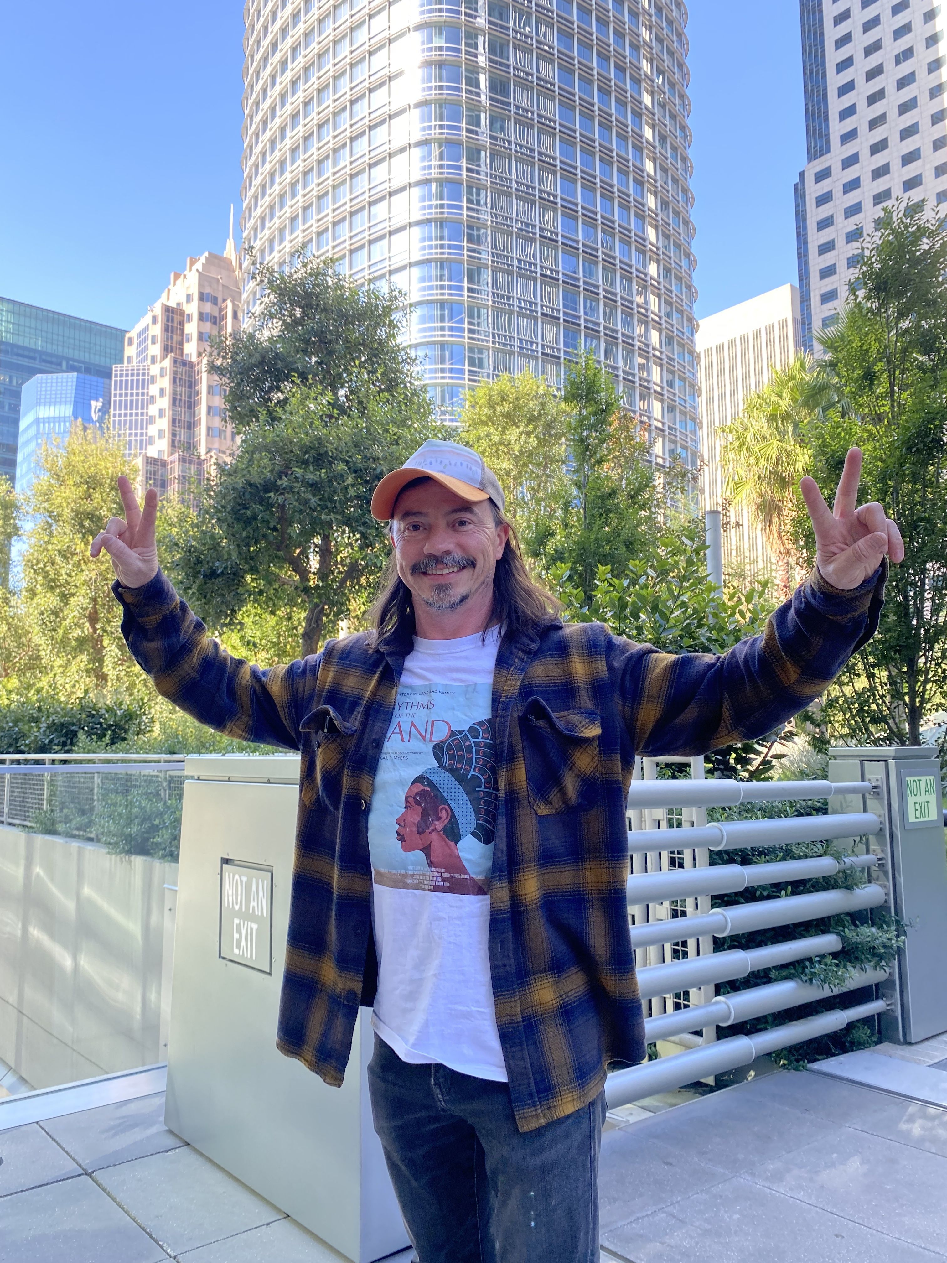 TOP OF THE WORLD, MA: Michael in the rooftop park area outside his downtown outlet