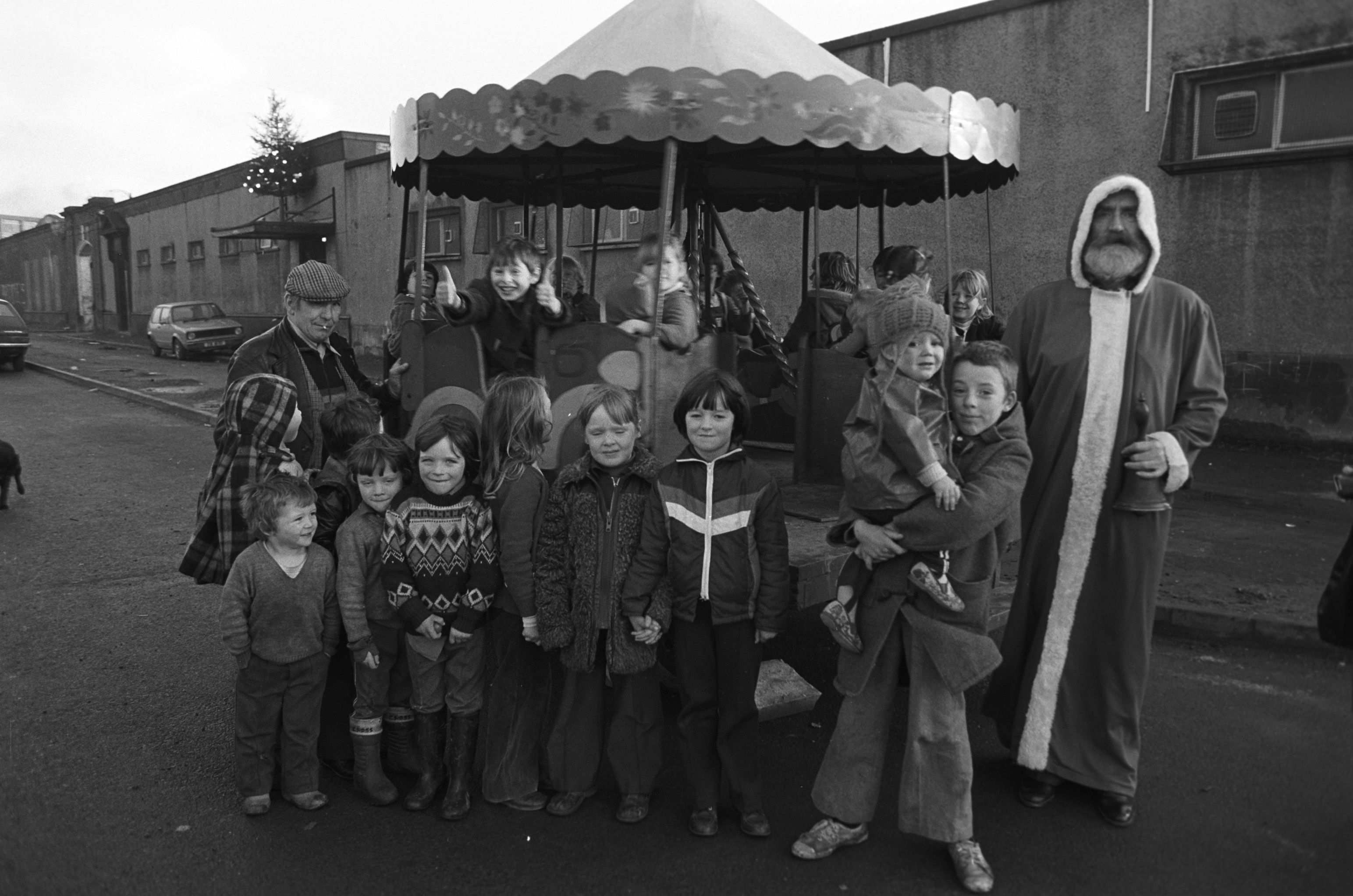 Santa and Mickey Marley's Roundabout at the Shamrock Club Christmas Show, Ardoyne, to benefit La Salle Boys Home, Kirkcubbin