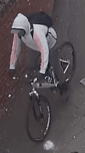 IMAGE: One of the gunmen arriving at the DC before killing Sean Fox