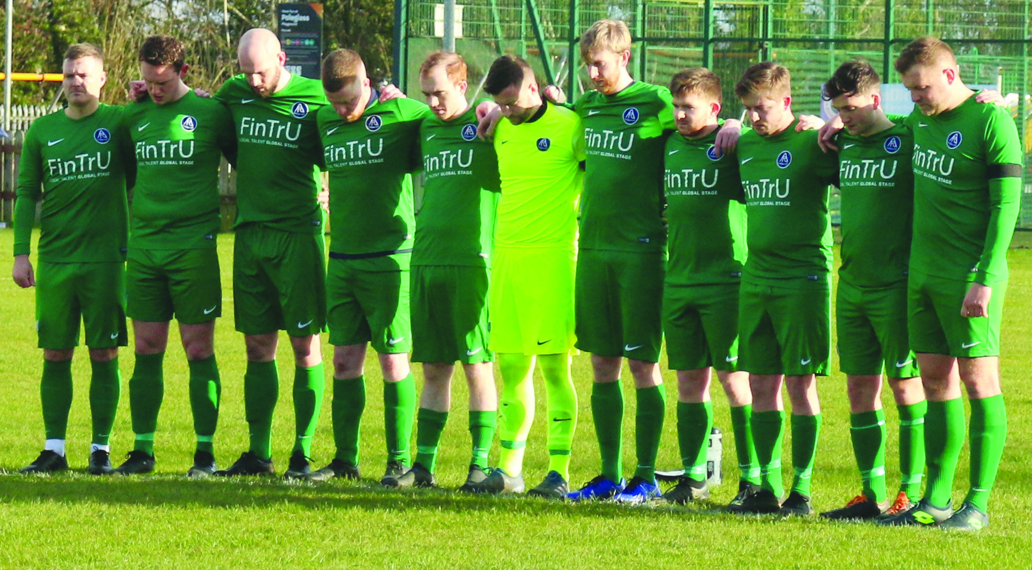 Aquinas players observe a minute’s silence for Fionntan McGarvey