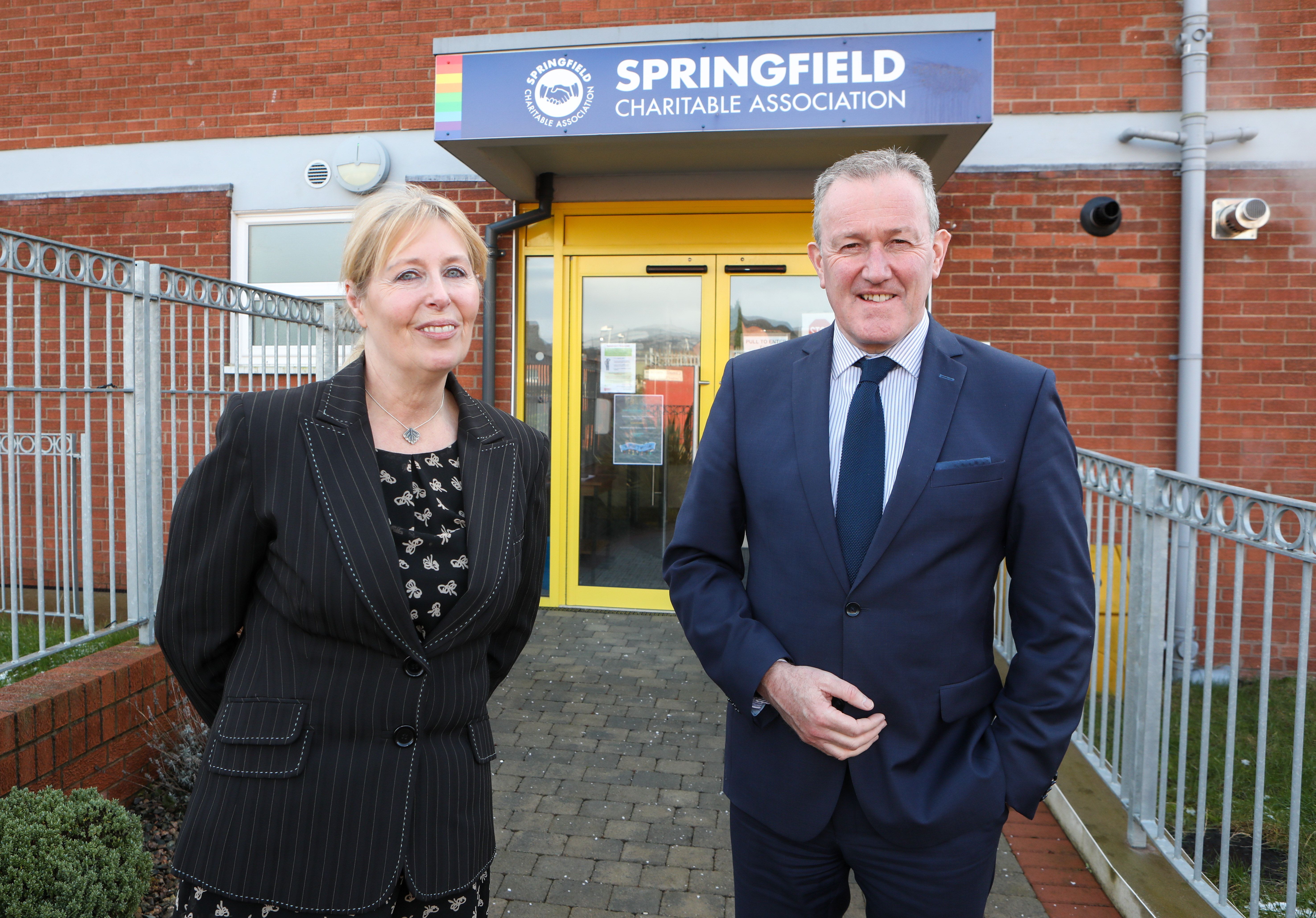 Minister Conor Murphy with Vivien Davidson during his visit to Springfield Charitable Association