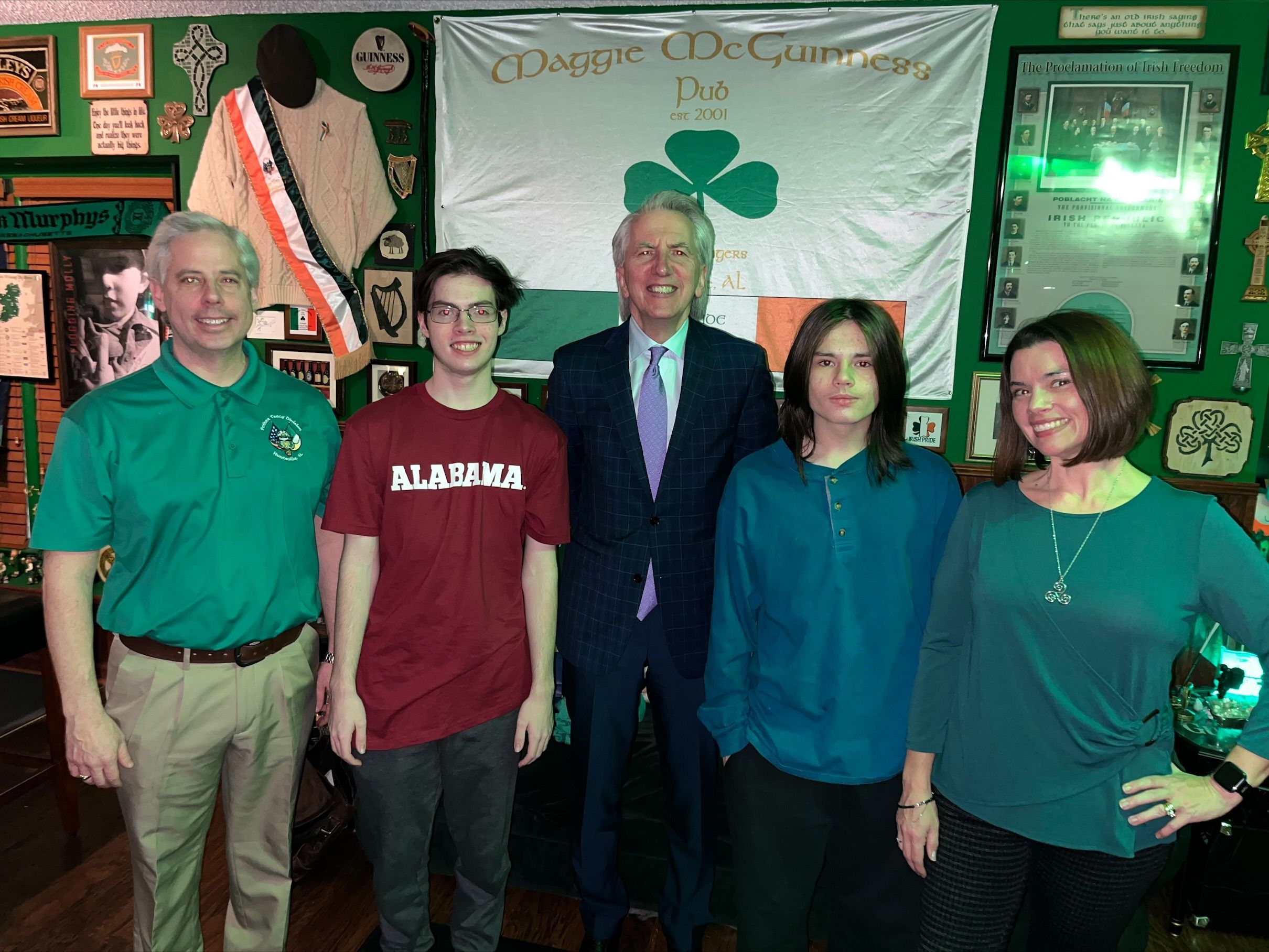 CÉAD MÍLE FÁILTE: Michael and Lisa Bollinger and sons Mason and Michael Robert welcome the author to Alabama