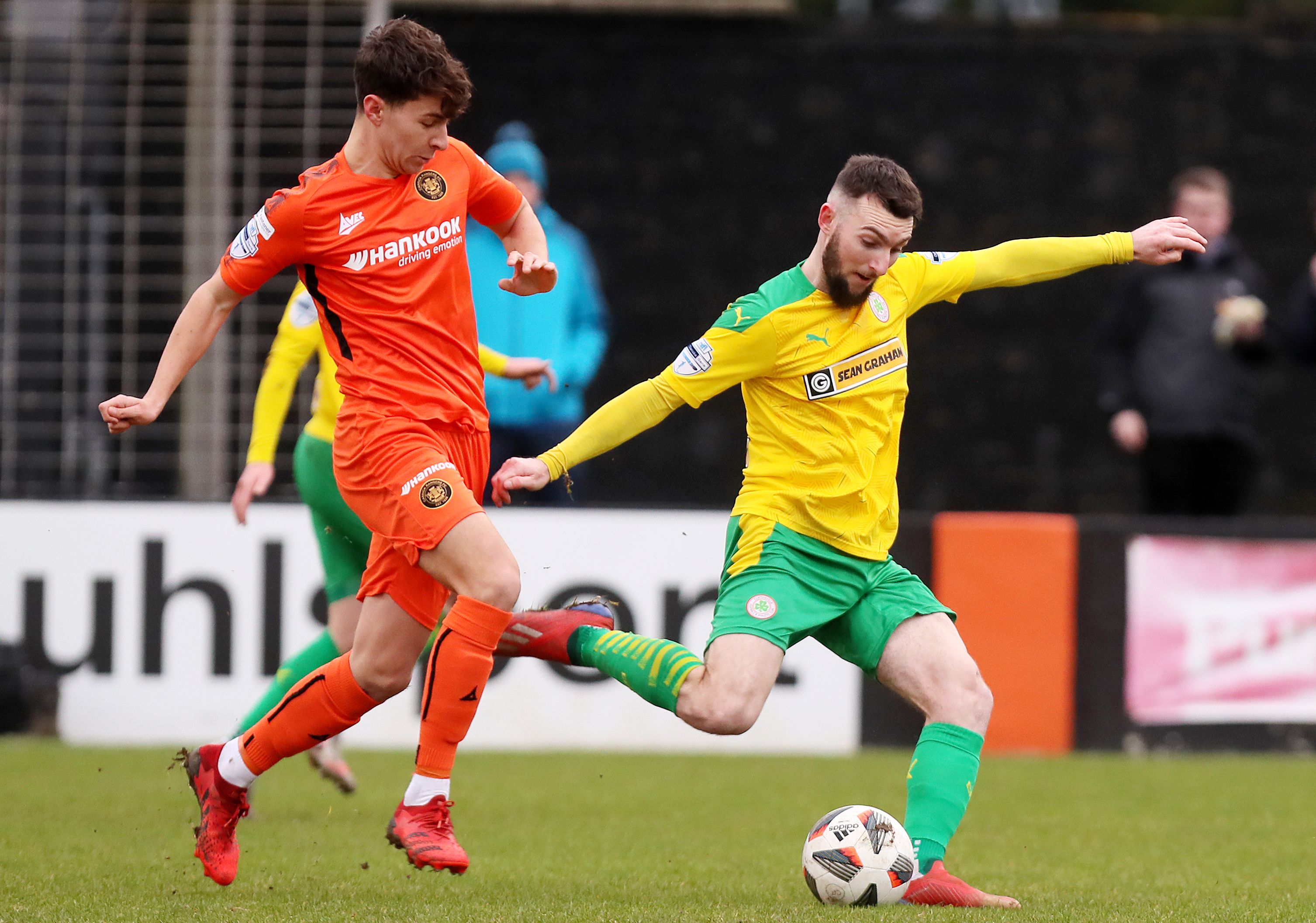 Jamie McDonagh takes a shot as Thomas Scully closes in