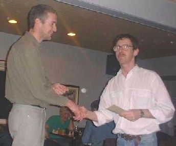 Michael Holmes accepts first prize at an RVH Chess Tournament (2001)
