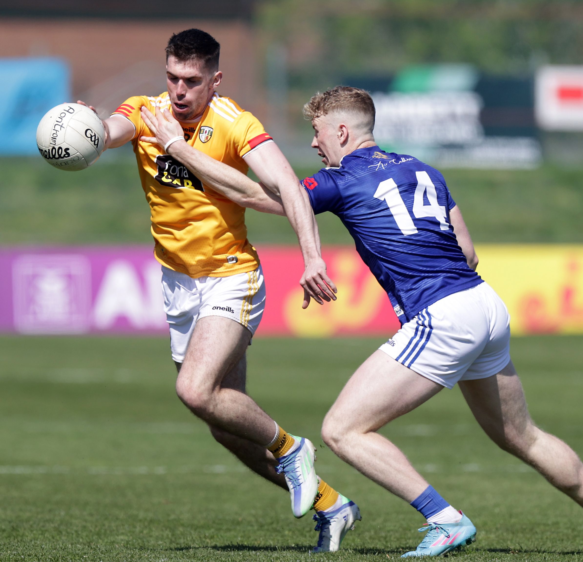 Kevin Small is challenged by man-of-the-match Paddy Lynch 