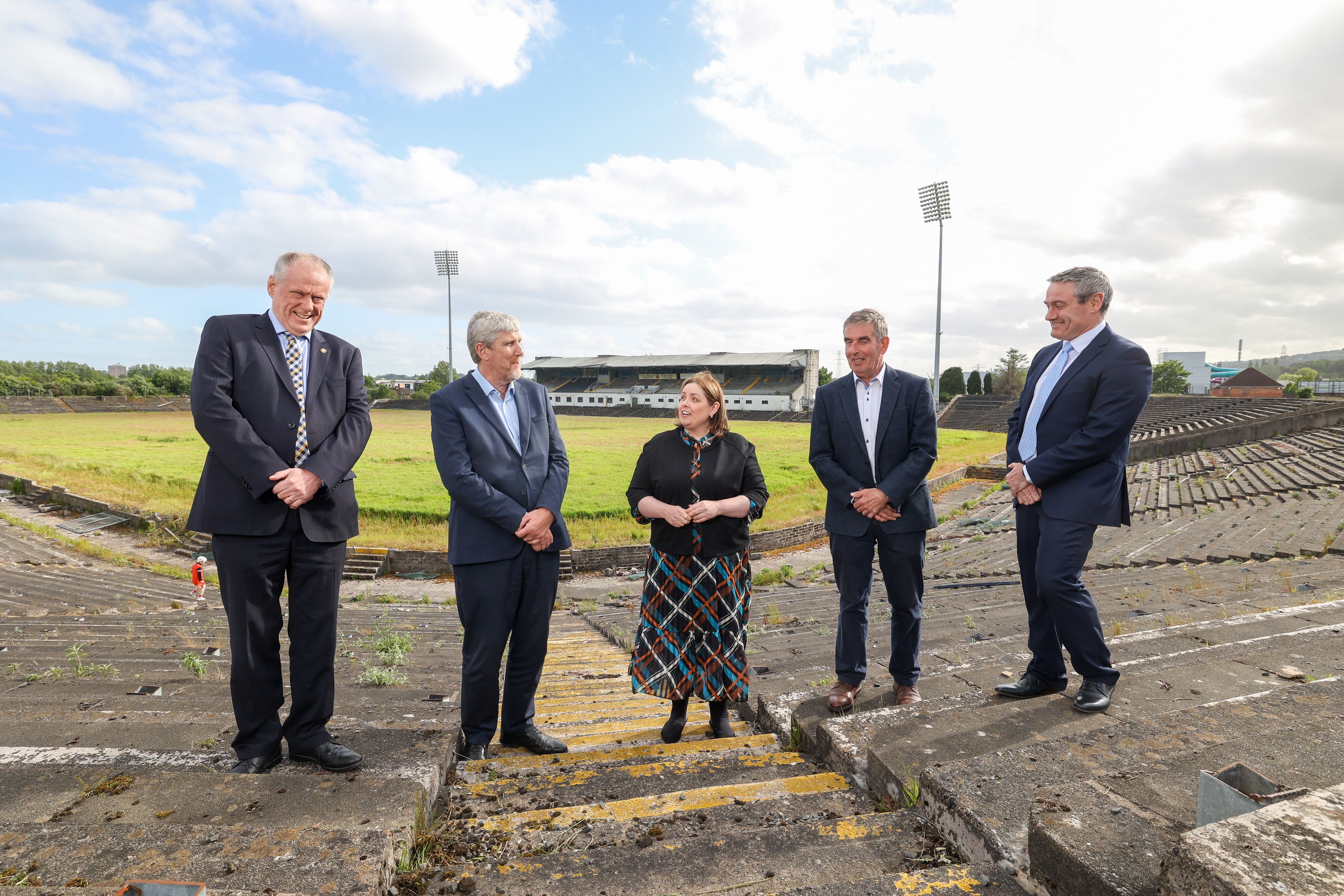 Communities Minister Deirdre Hargey and Infrastructure Minister John O’Dowd at Casement Park with Brian McAvoy, Secretary of Ulster GAA; Tom Daly, Chair of Casement Park Stadium Development Board and Ciarán McLaughlin, President of Ulster GAA