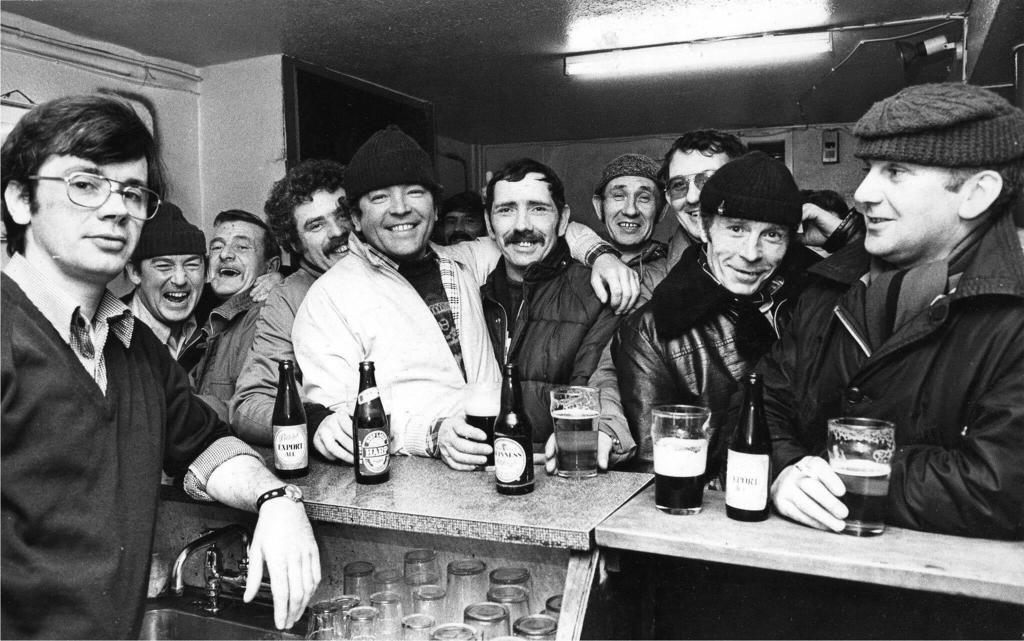 Liam (right) with fellow dockers.