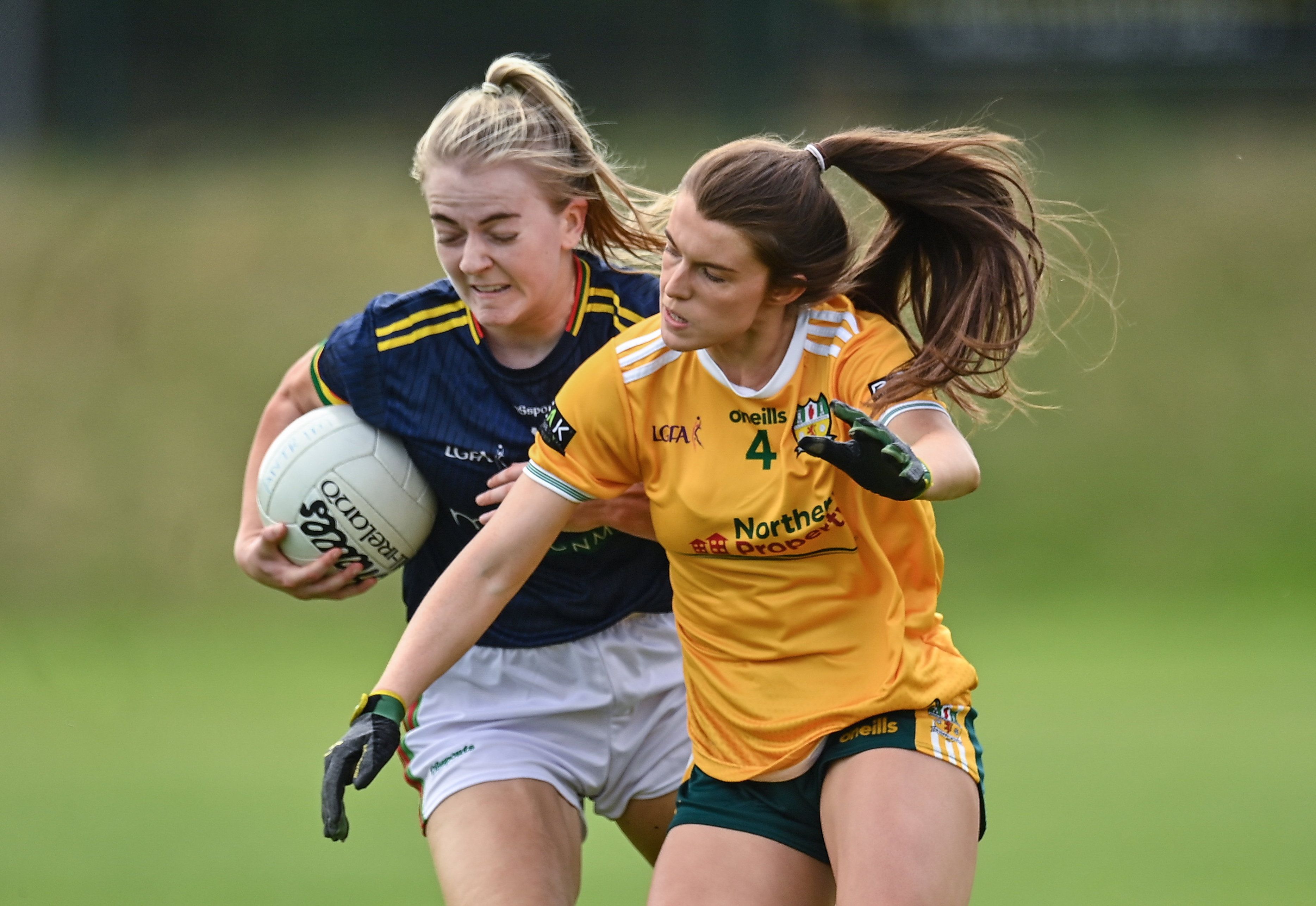 Rachel Sawyer of Carlow is challenged by Niamh McIntosh