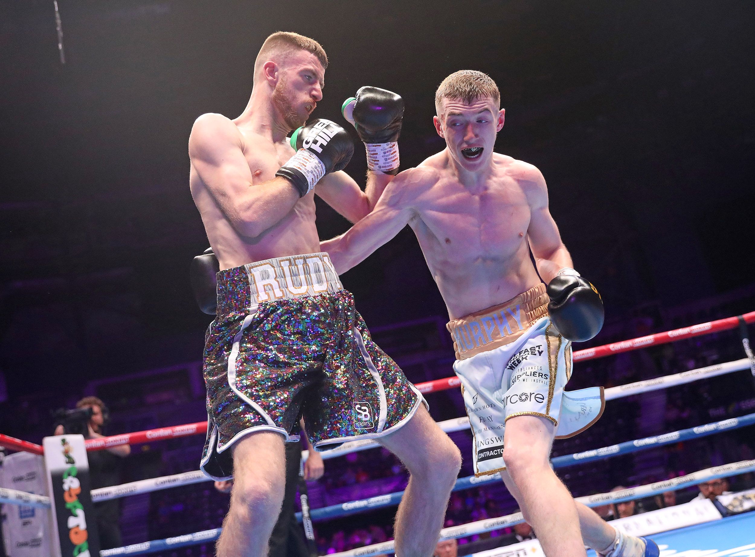 Colm Murphy lands on Ruadhan Farrell 