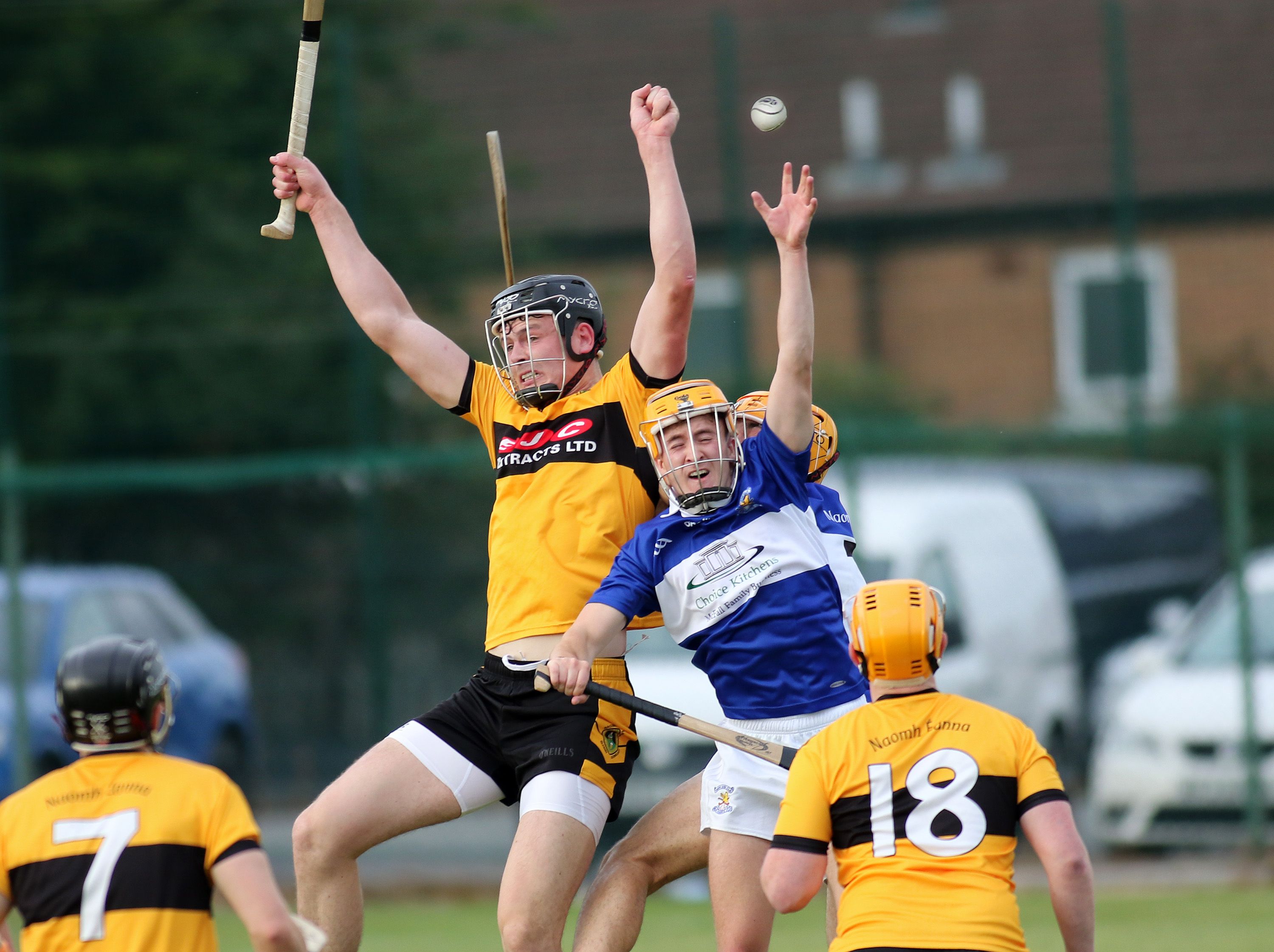 Players challenge for a high ball