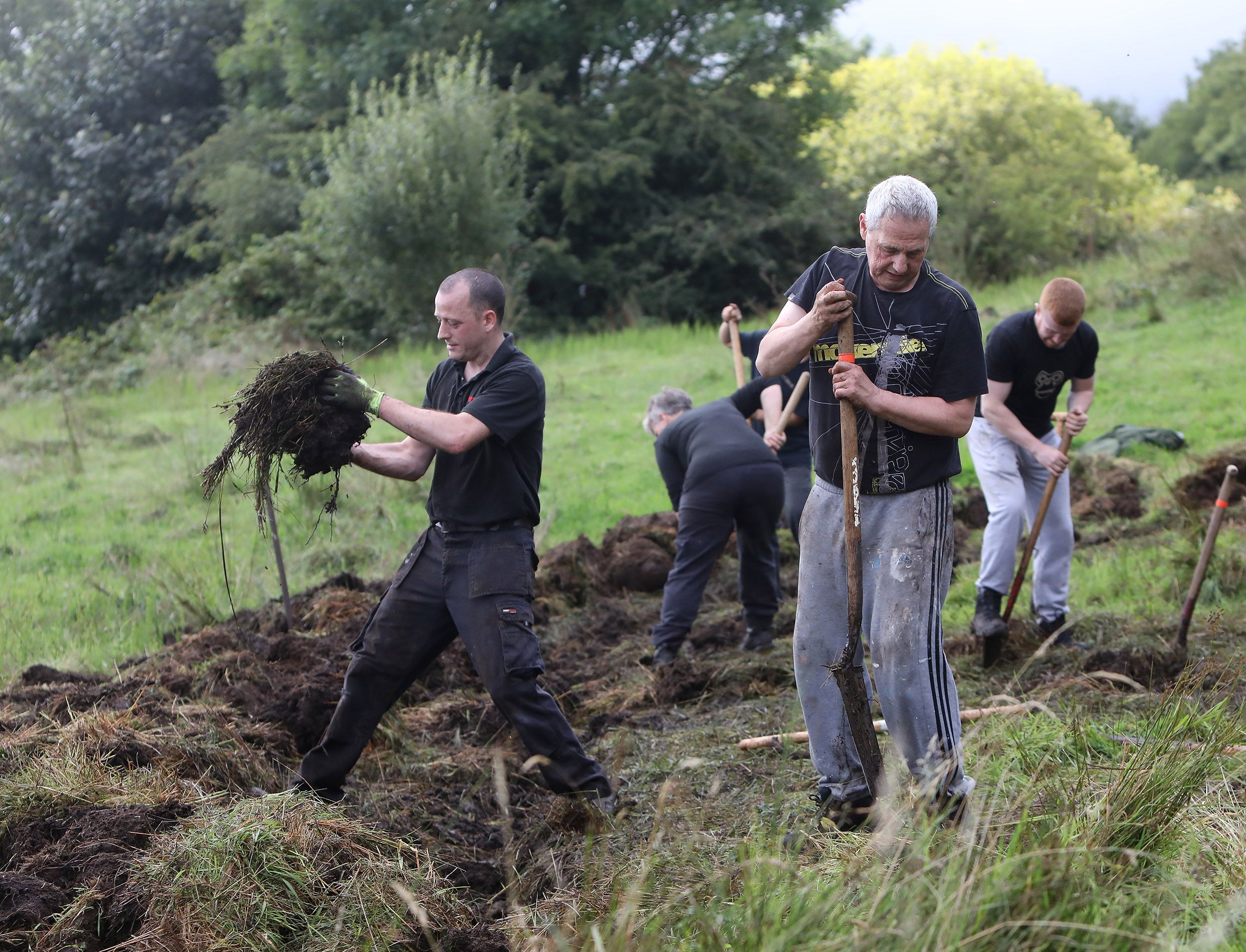 Locals come together to begin work