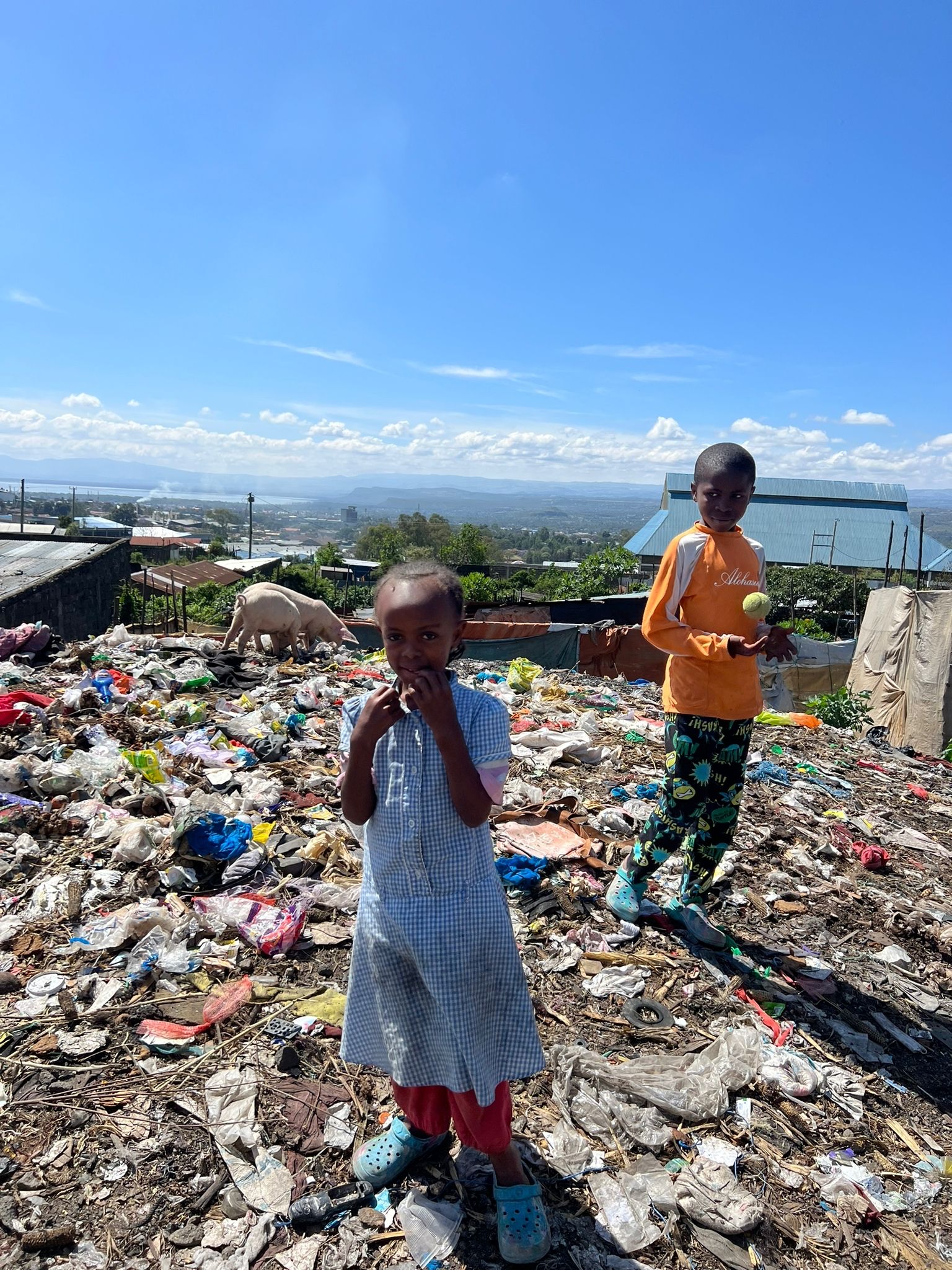 KENYA: Local children at the dump site near where Frankie's Nursery is situated