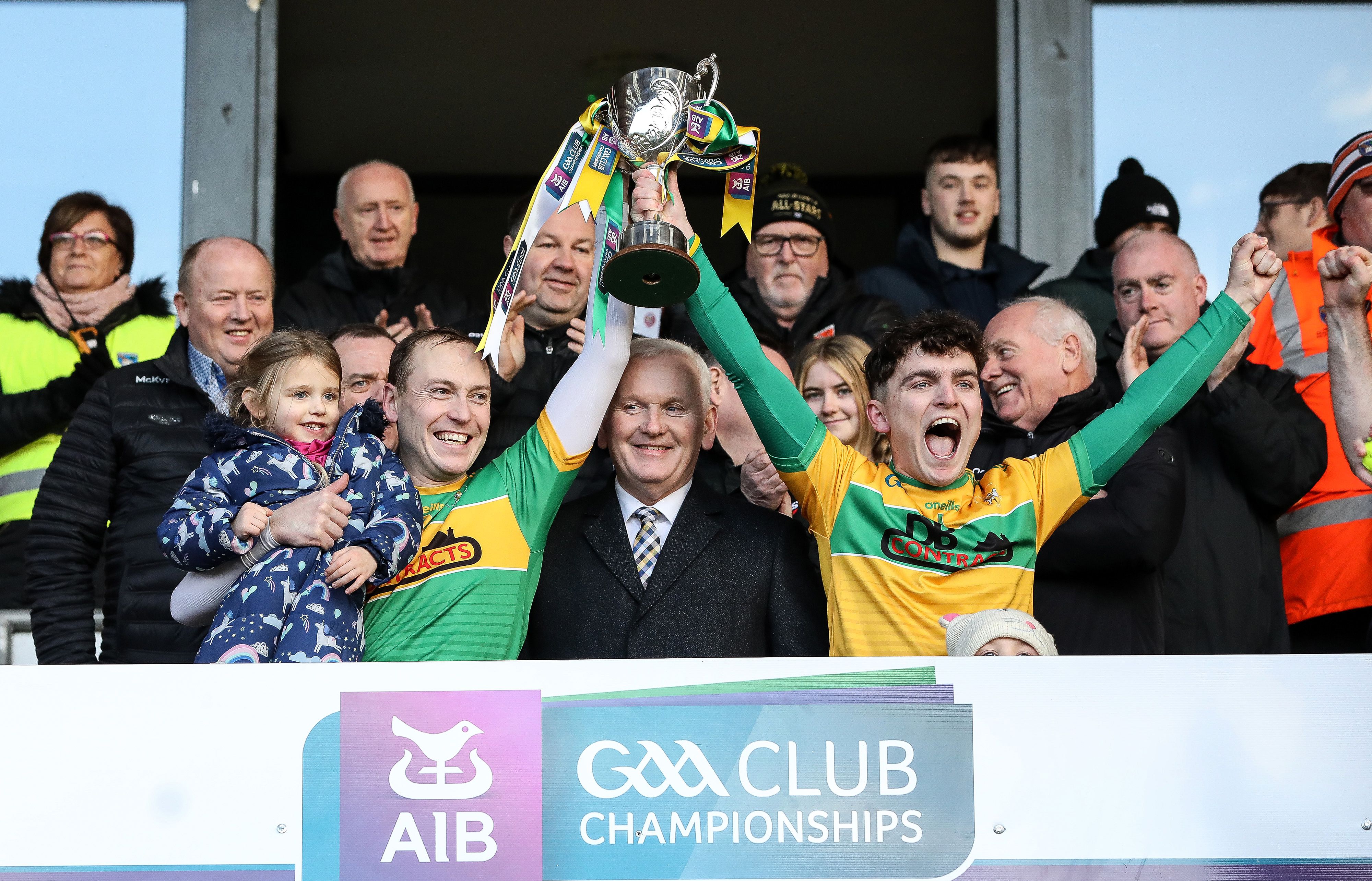 Elliott lifts the Four Seasons Cup with joint-captain Paul Shiels after Dunloy's Ulster final win over Slaughtneil