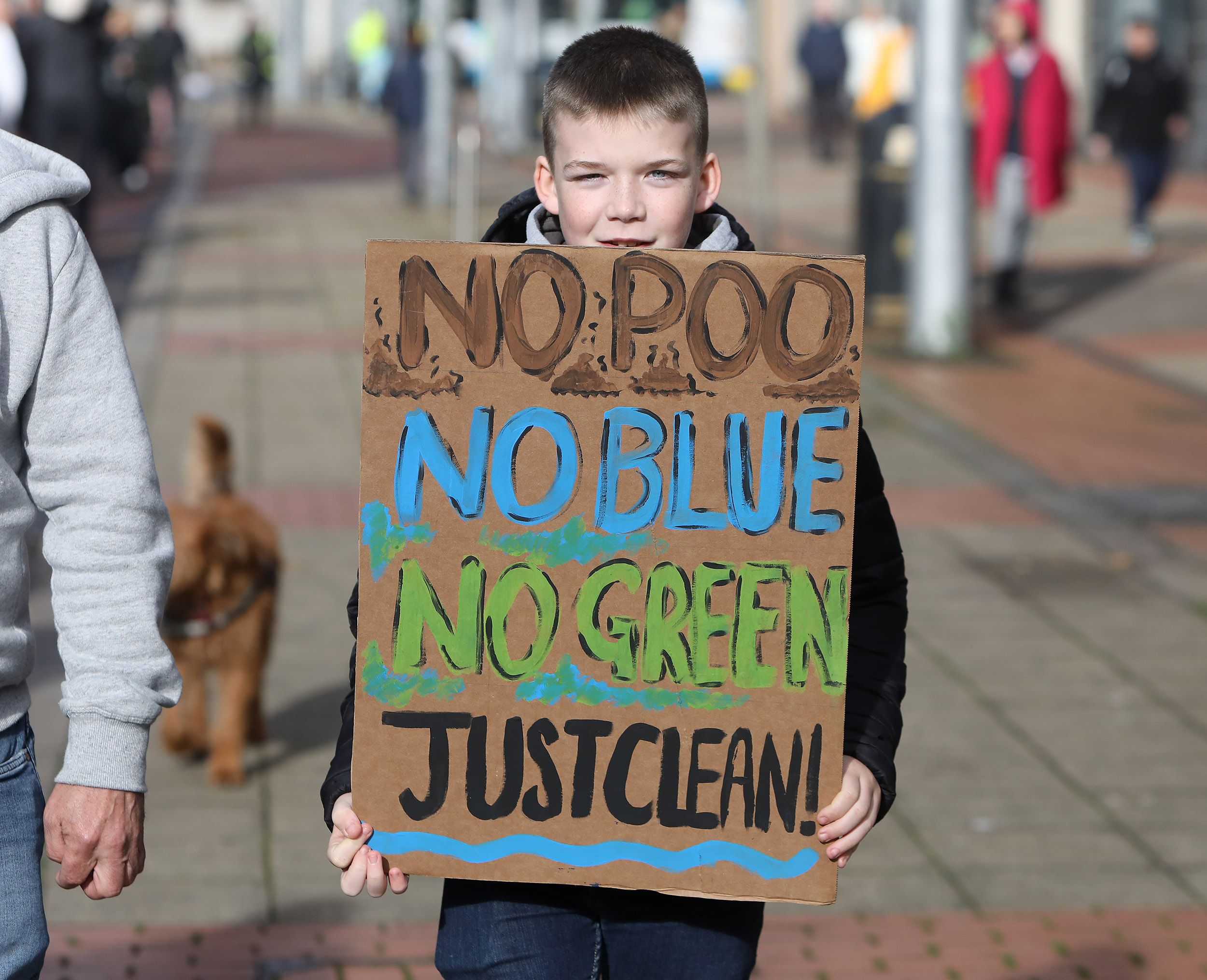 CLEAN UP: A protestor calls for an end to pollution at the Lough
