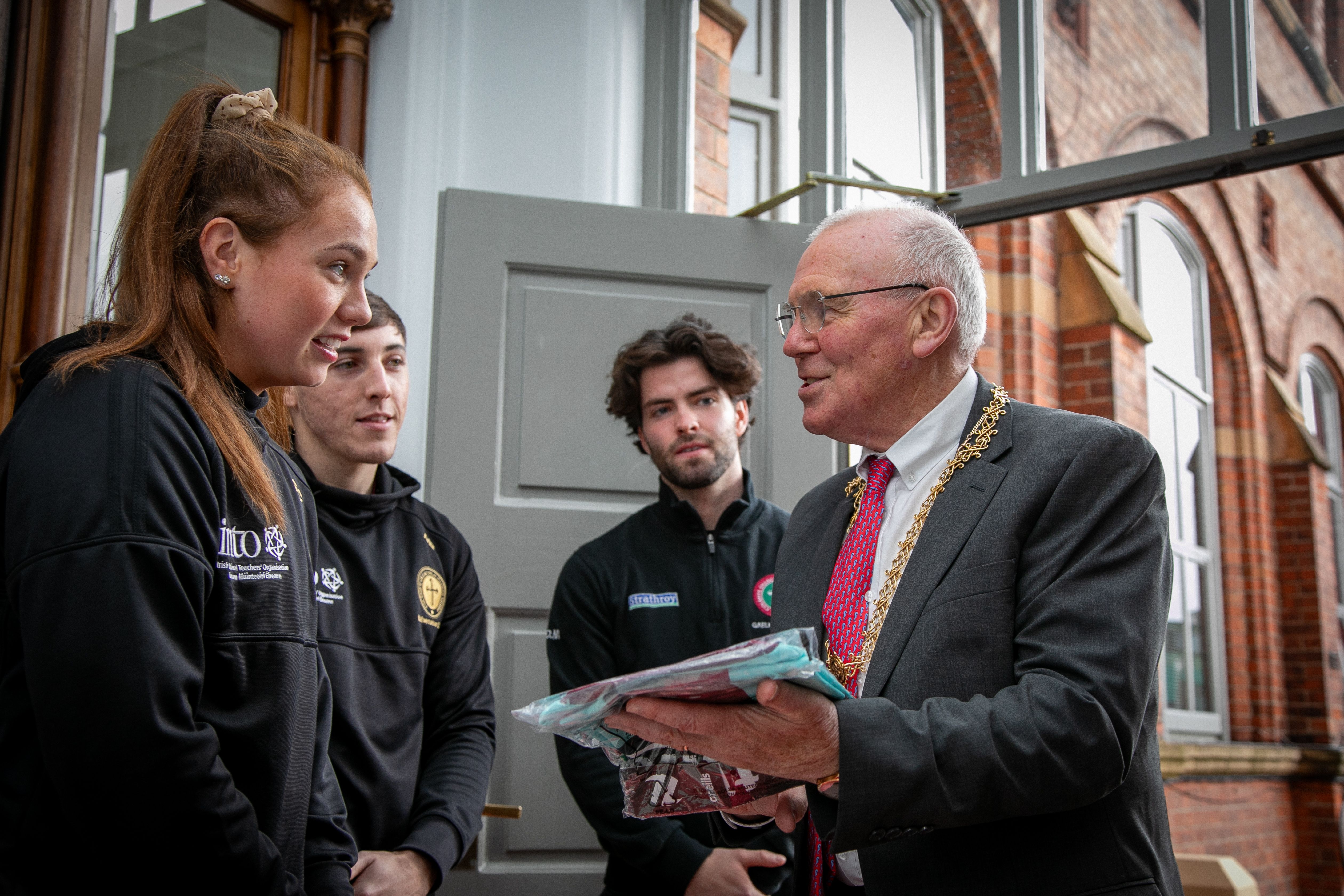 FÁILTE: The High Sheriff is welcomed to St Mary’s University College Belfast by members of the Student Union Executive