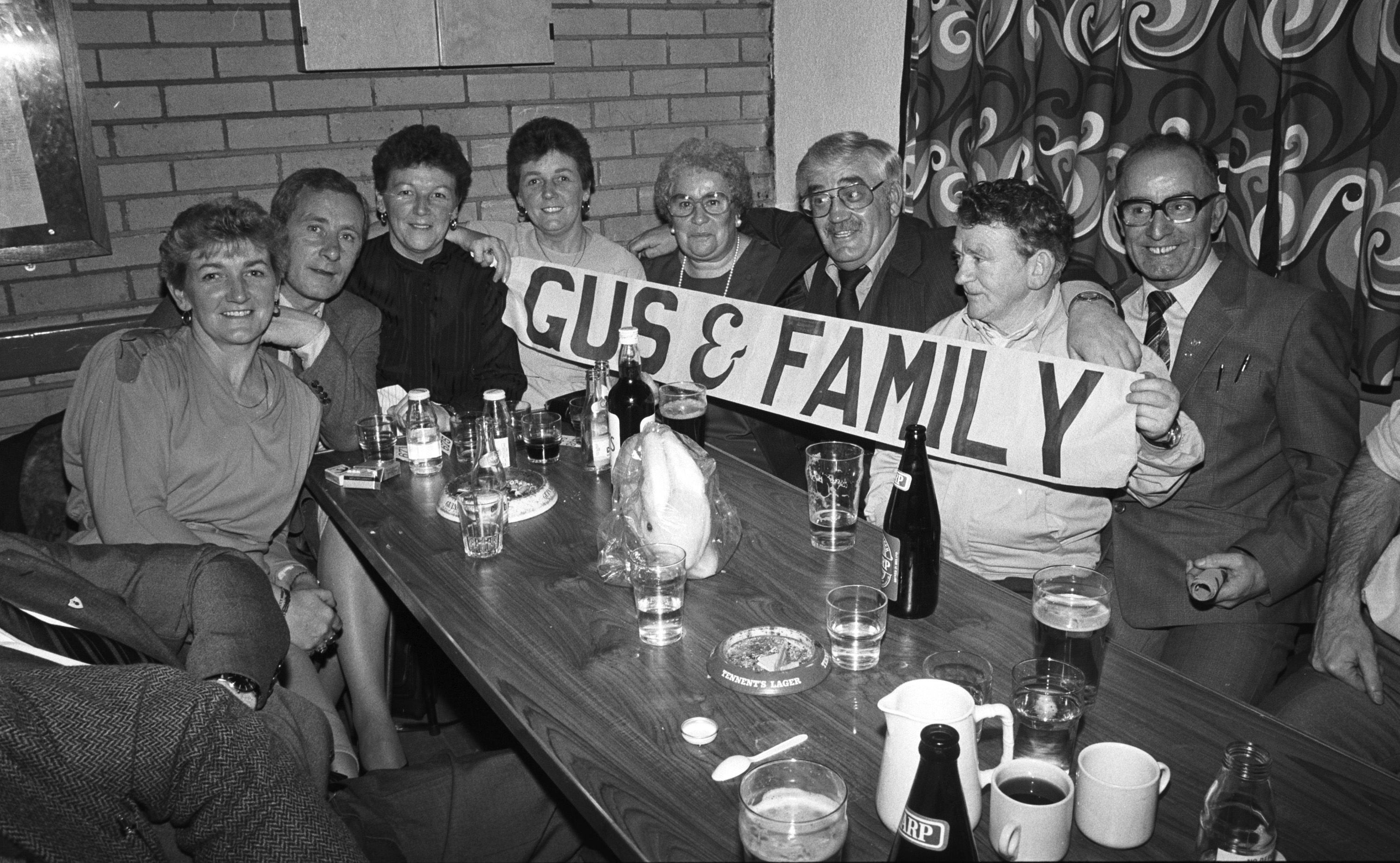 Patsy and Gus Matthews (also St Clements, California), with friends and relatives Amelia Murphy, Henry and Peggy Fitzsimmons, Andy McKinney and Gerry Torbitt at the Carrick Hill function for ‘Wee Priest’ in Trinity Community Centre