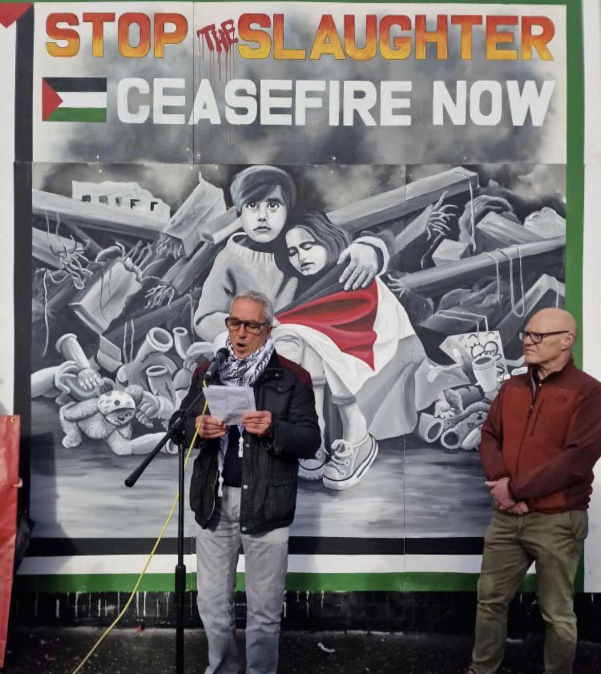 PROTEST: Pat Sheehan MLA speaking at the new International Wall mural