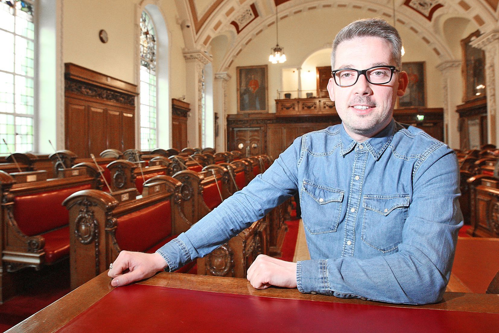 FIRST CITIZEN: Seanadóir Niall Ó Donnghaile in Belfast City Council chamber where he served as Lord Mayor from 2011-2012