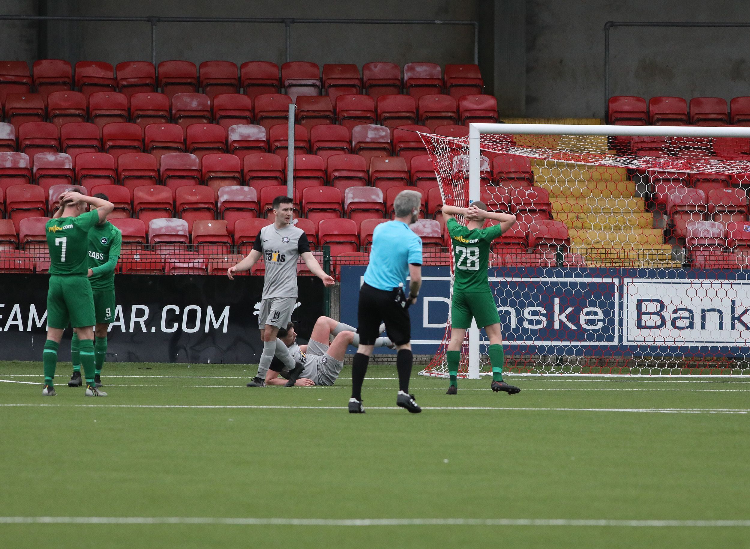 Paul Donnelly holds his head in his hands as a chance goes abegging 