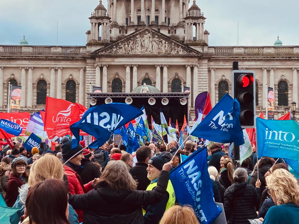Teachers and Health workers standing in solidarity