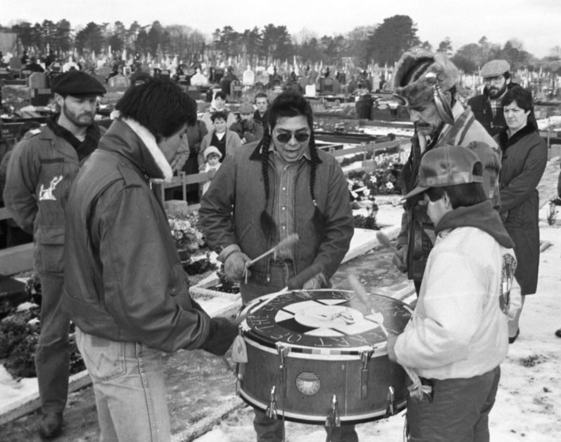 TRIBUTE: Clyde Bellacourt, right in fur hat, with AIM colleages at the Republican Plot in 1985