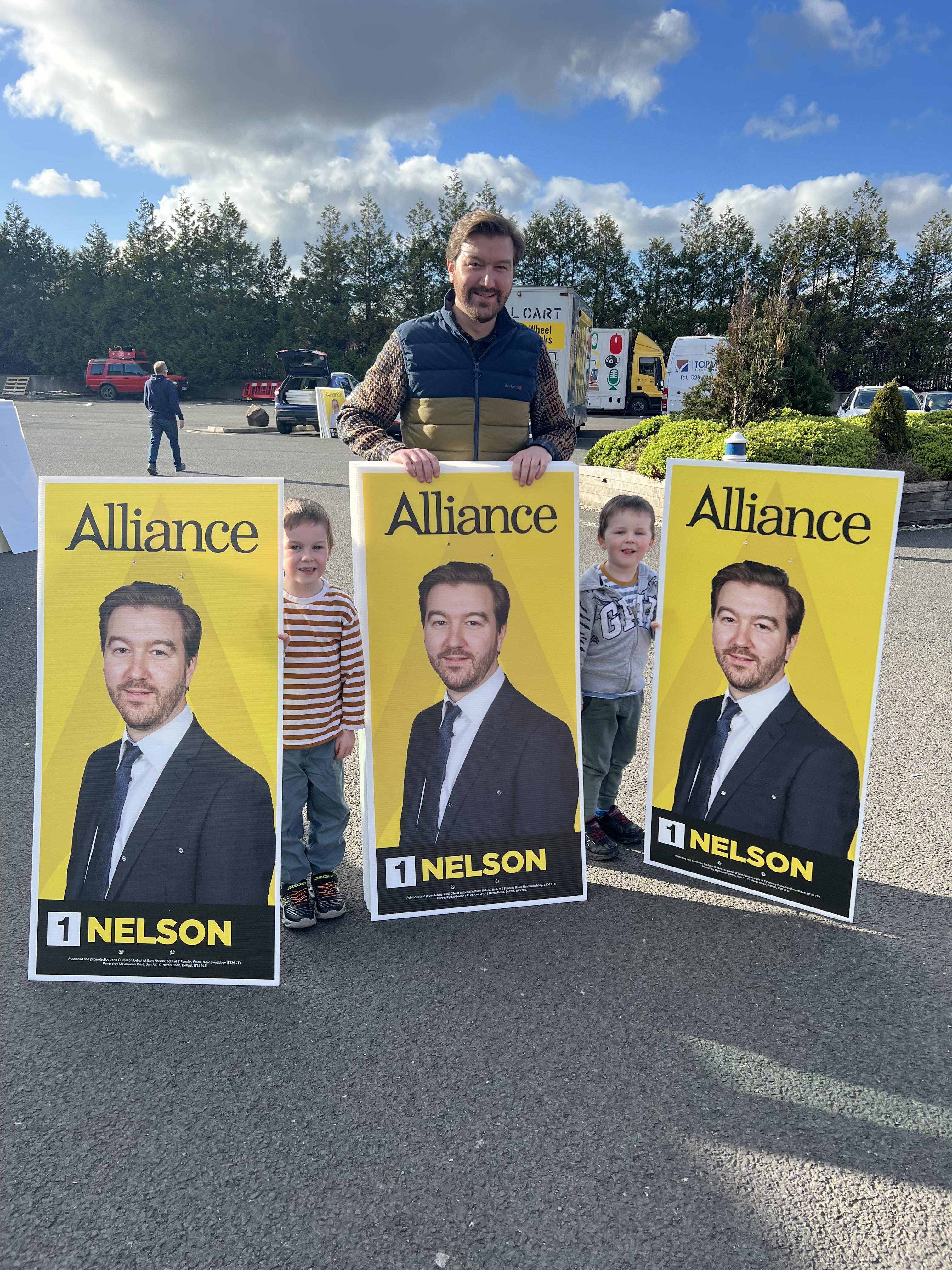 Sam Nelson on the election trail with children, Finn (6) and Art (4)