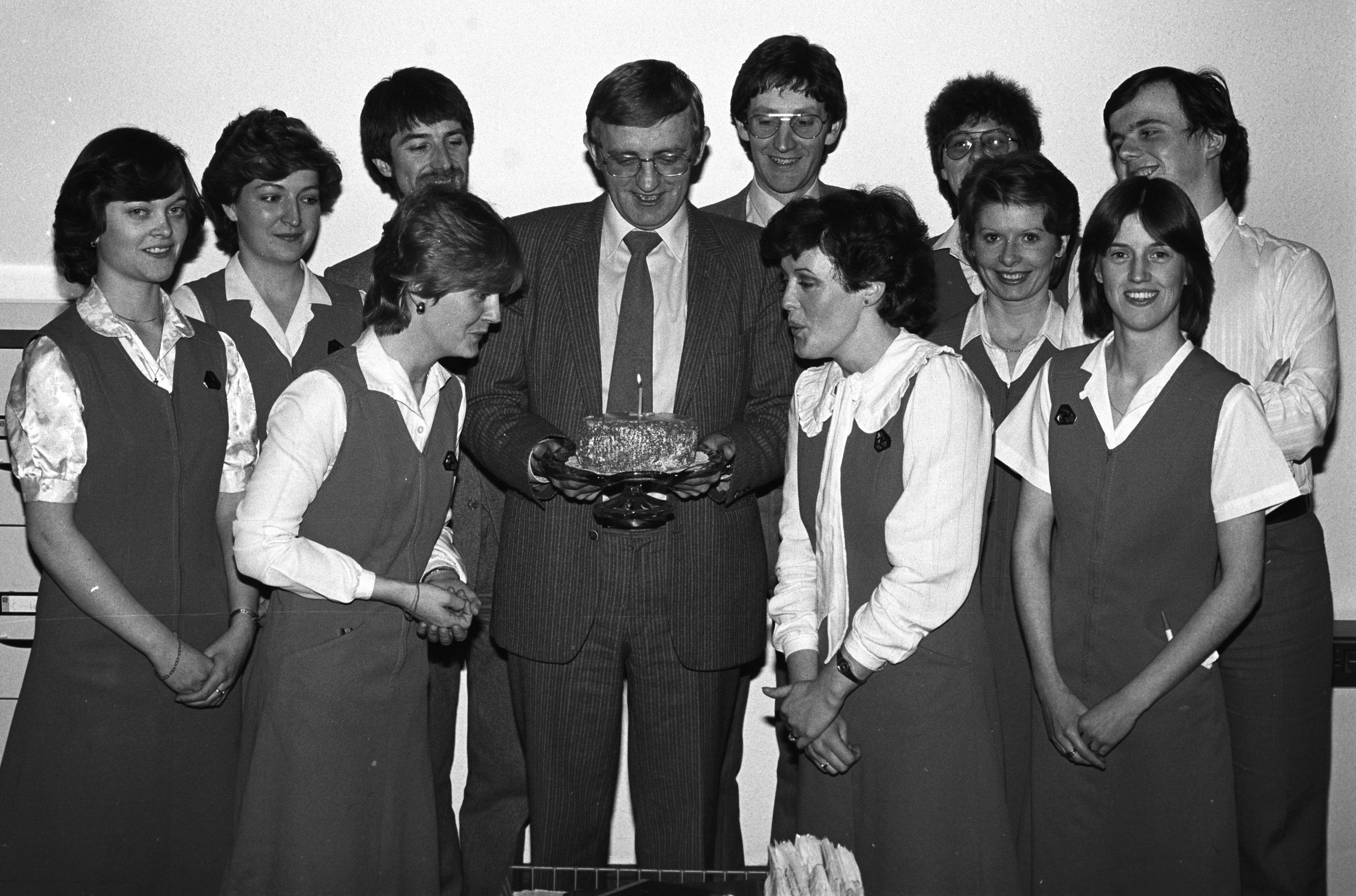 Ulster Bank staff celebrate one on from their return to Andersonstown with manager Fonsie Corr, Teresa and Patricia