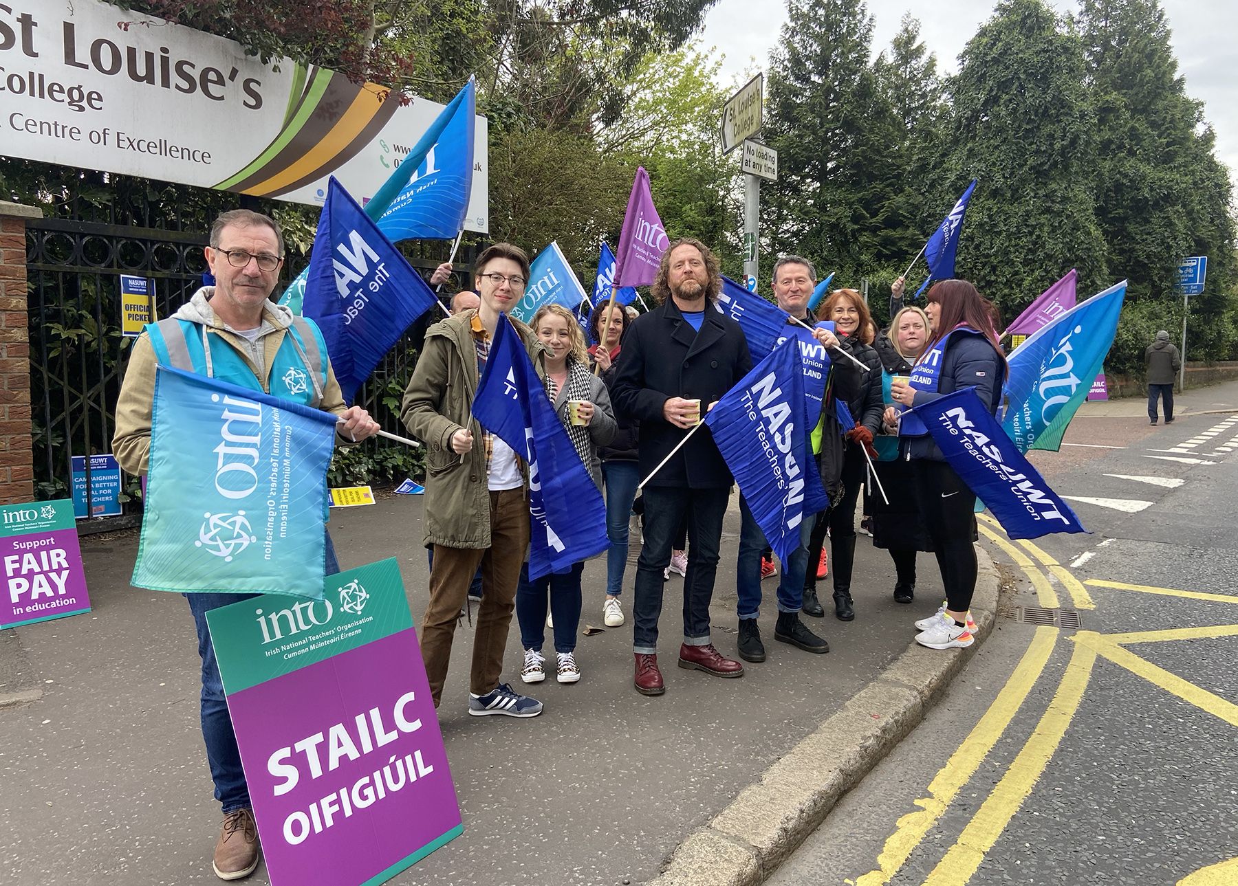 STRIKE: Eamonn McDowell of NASUWT (centre-right) and teachers on strike outside St Louise's STRIKE: Eamonn McDowell of NASUWT (centre-right) and teachers on strike outside St Louise's