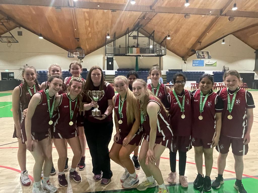 The players are presented with the winning trophy in the National Basketball Arena, Dublin