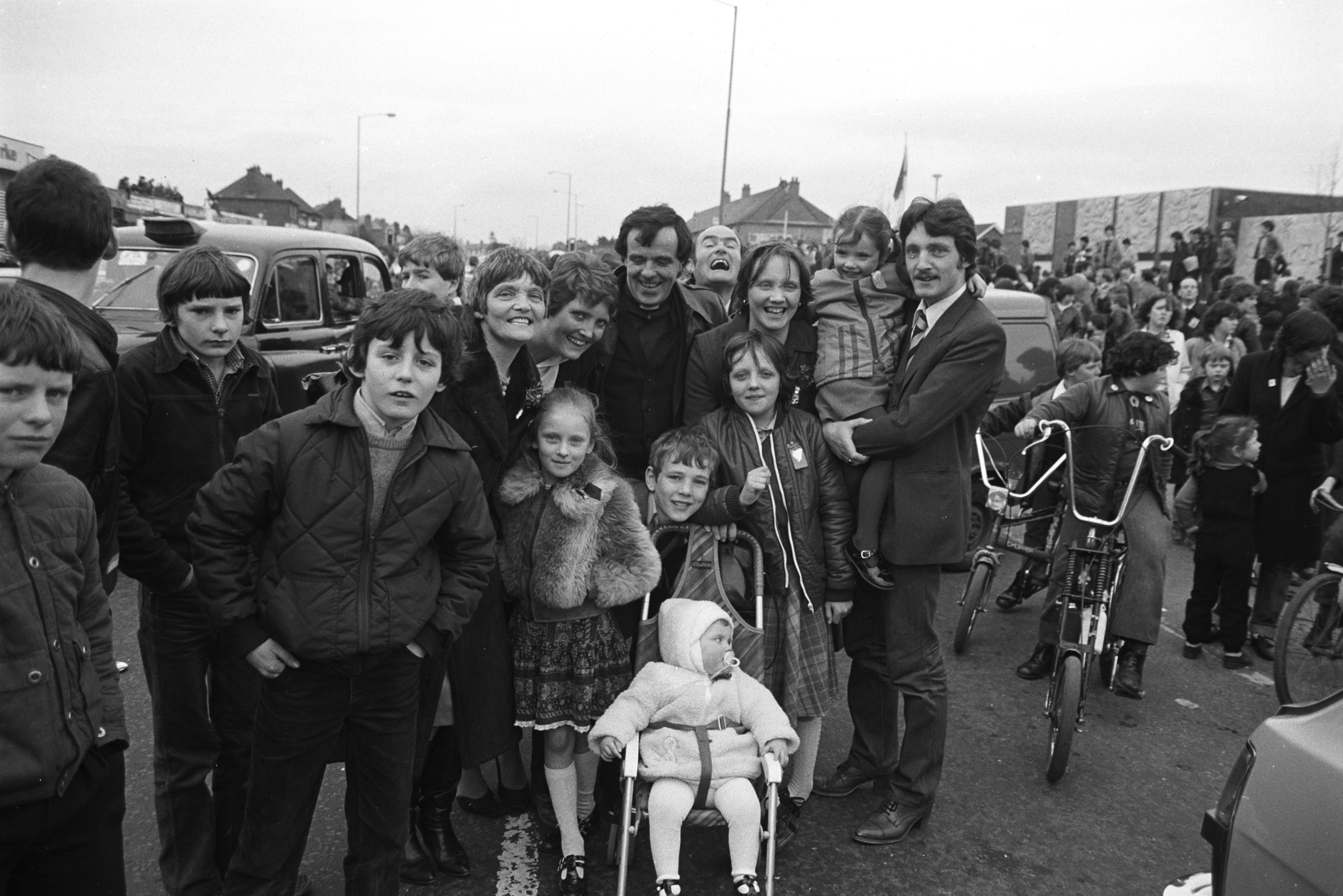 Fr Matt enjoying the craic on the Andersonstown Road during the 1981 St Patrick's Day parade