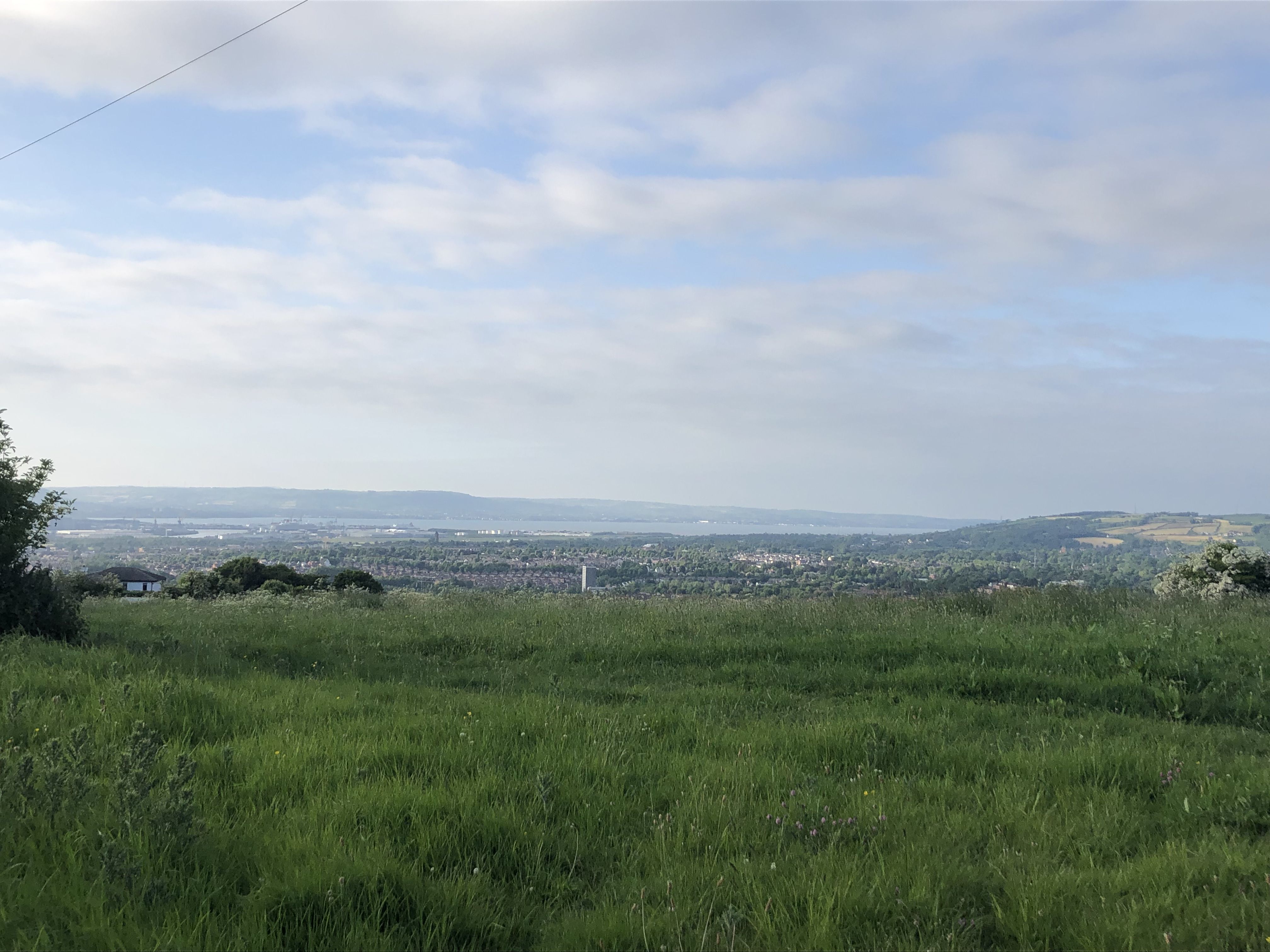 CON O'NEILL: The view from what was Conn's castle (the hawthorn bush to the right is all that remains) PANORAMIC: The view from what was Con's castle (the hawthorn bush to the right is all that remains)