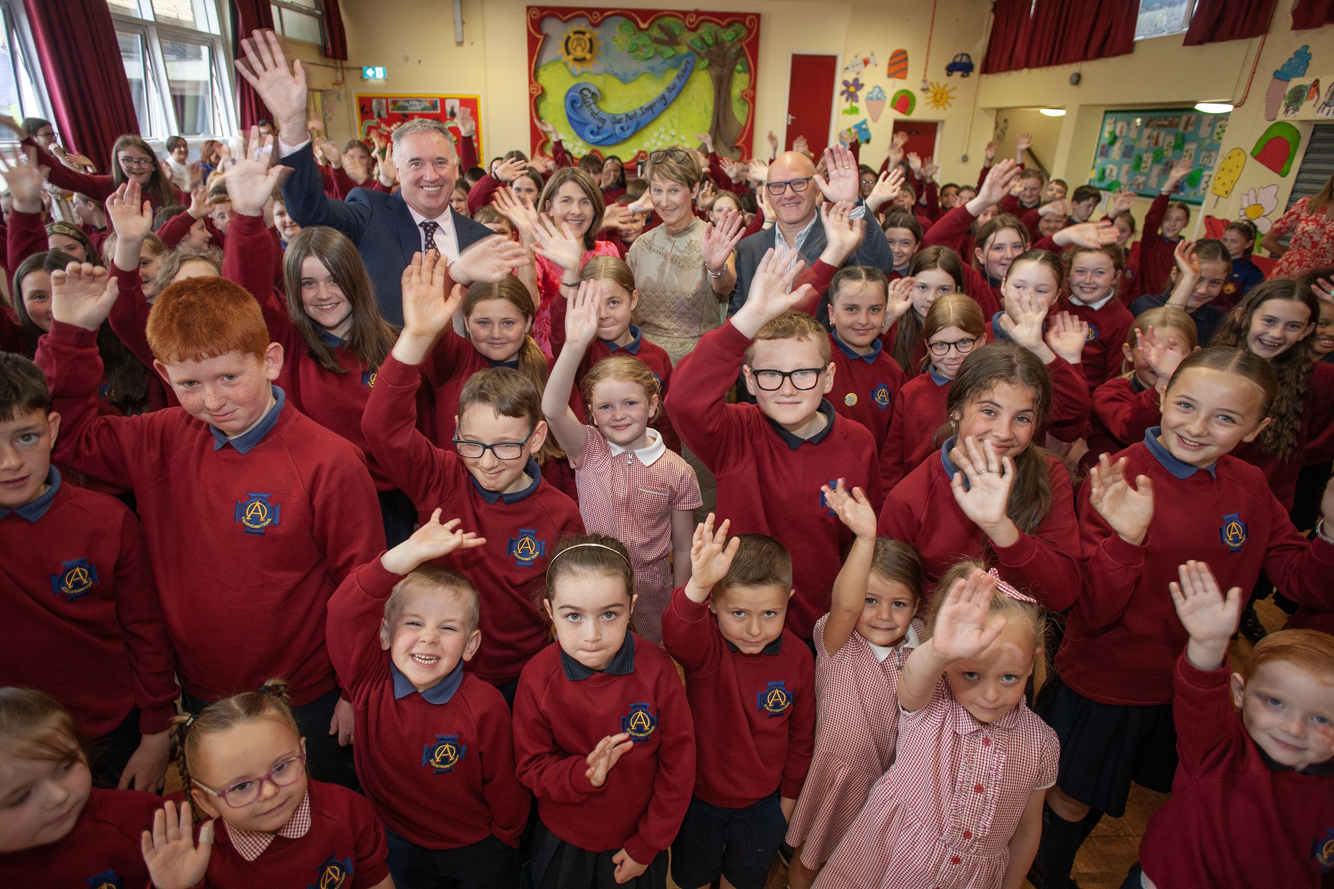 AWARD: Pupils from St Oliver Plunket with Principal Paddy McCabe, teacher Mrs O'Keefe and MP Paul Maskey